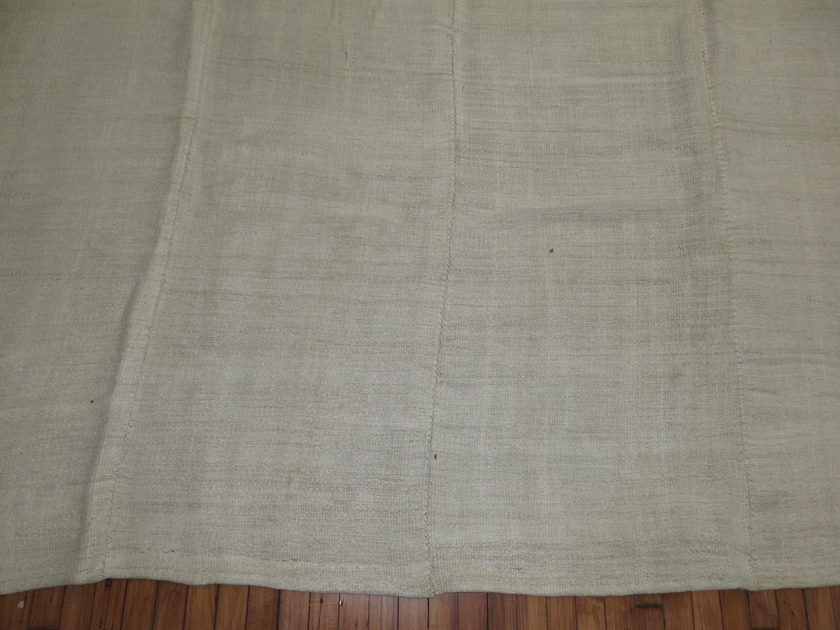 One of a kind vintage Turkish kilim in white from the third quarter of the 20th century. Sturdy, versatile. and chic. One of a kind / hand knotted.

Measures: 8'1