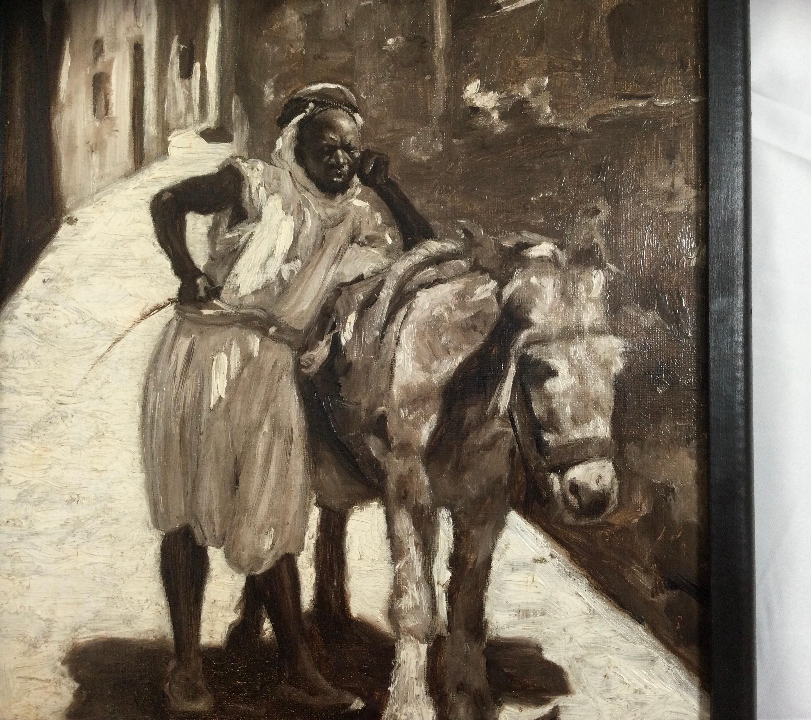 Außergewöhnliches monochromes orientalistisches Werk, das einen Mann darstellt, der sich auf seinen Esel in einer Gasse stützt. Trotz der impressionistischen Pinselstriche wirkt das Gesicht des Mannes fast fotorealistisch. Signiert unten links von