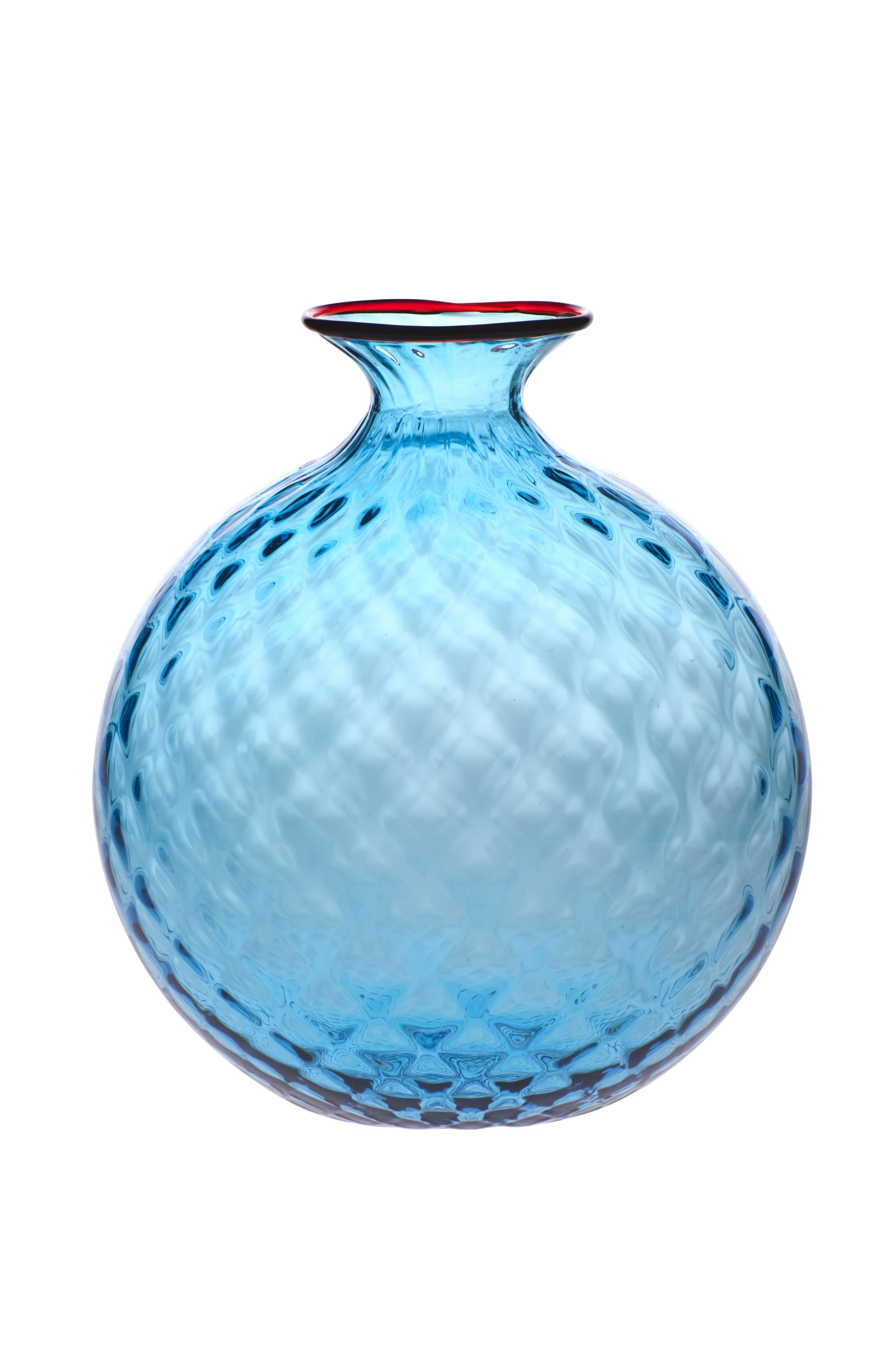 Venini glass vase with full body and textured surface with hexagonal shaped pattern in aquamarine designed in 1970. Perfect for indoor home decor as container or strong statement piece for any room. Also available in other colors on 1stdibs. Limited