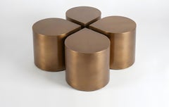 Vierteiliges modulares Set aus monolithischem, patiniertem Metall: Couchtisch und Beistelltisch
