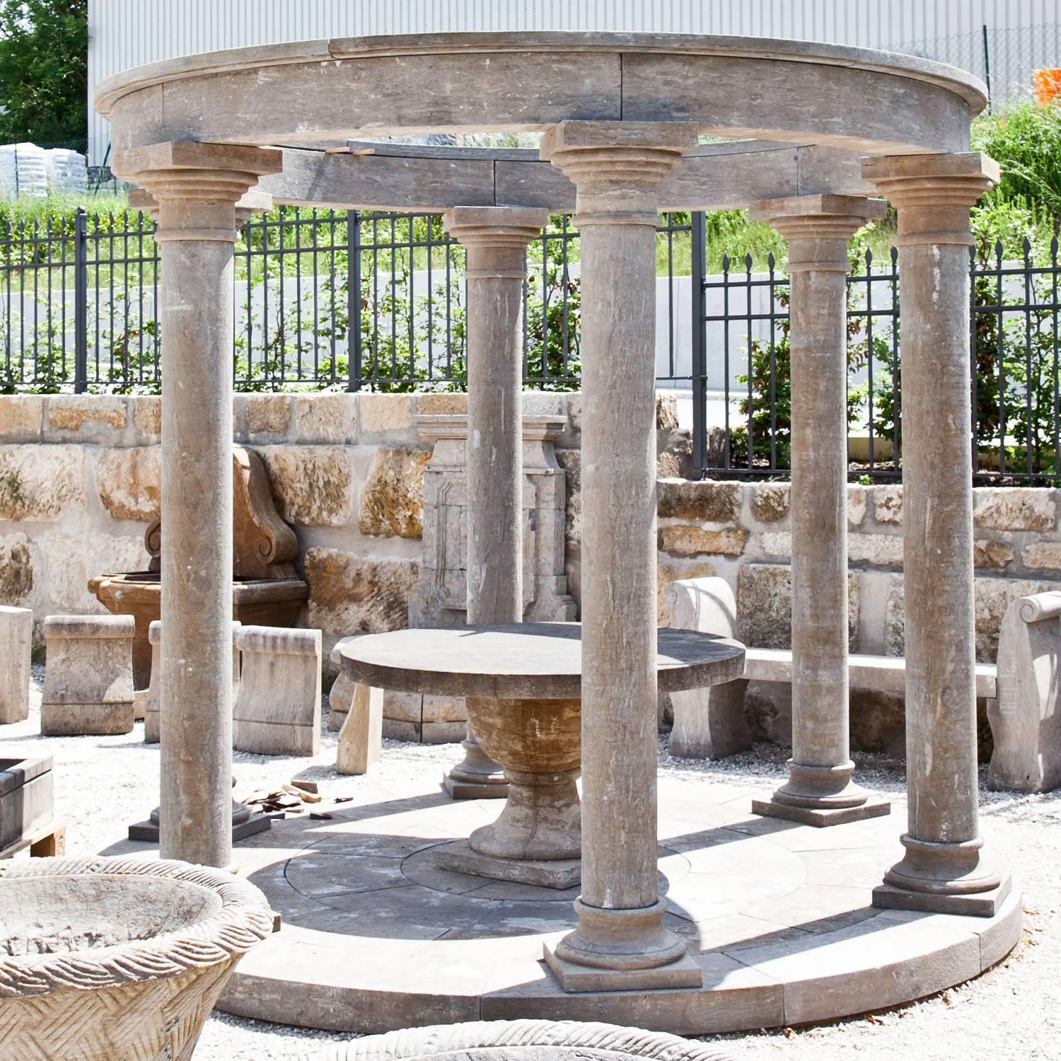 Large round pavilion with six smooth columns and a straight architrave in the style of a classical Monopteros.