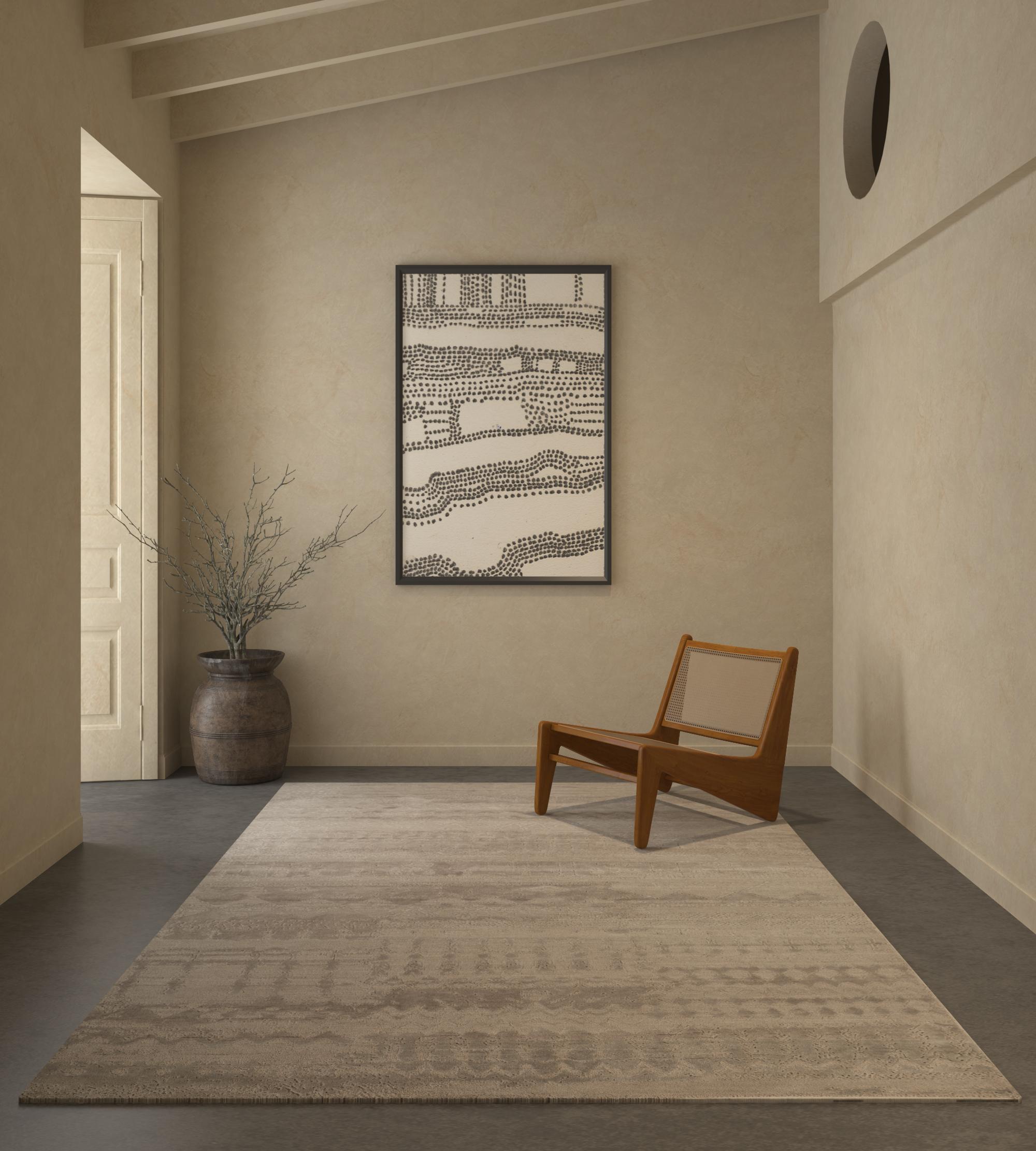 Questo bellissimo tappeto fatto a mano è un capolavoro raffinato che fonde perfettamente l'artigianato tradizionale con un'estetica contemporanea. Una delle più belle creazioni della nostra collezione Weaver Art Reserve, questo tappeto sfoggia un
