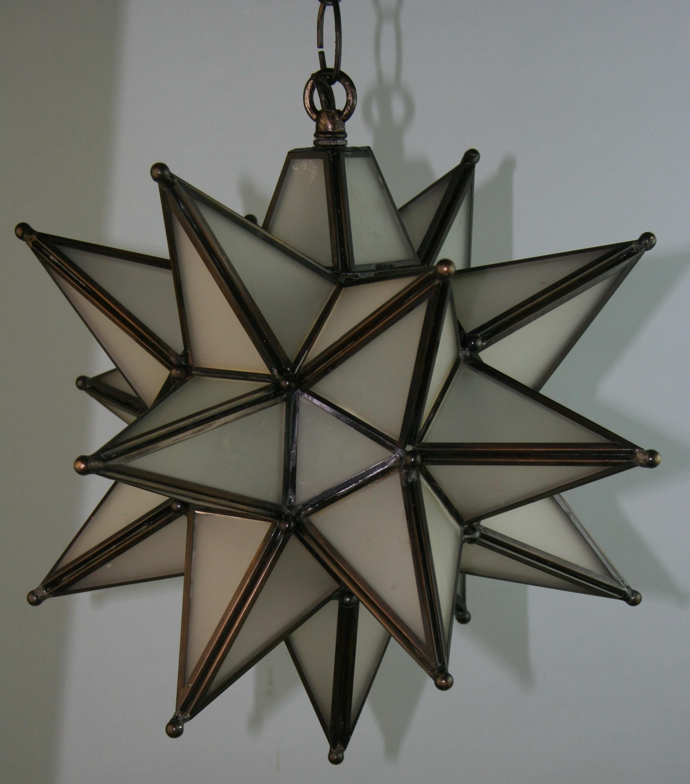 Monrovian star frosted glass pendant
Rewired takes one 60 watt  bulb
Supplied with 3 feed chain and canopy.
2 available priced individually
