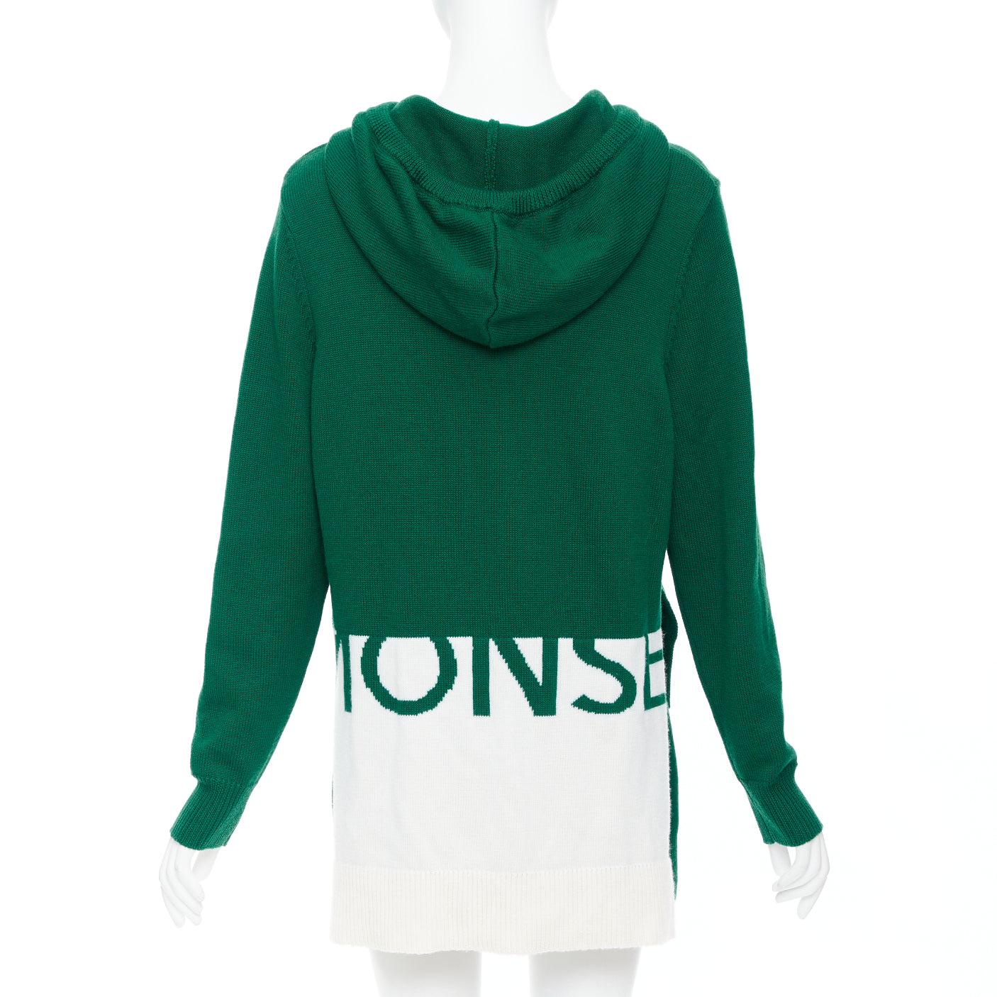 MONSE 2021 Runway green white logo polo  hood sweater mini skirt
Reference: NILI/A00084
Brand: Monse
Collection: Pre Fall 2021
Material: Feels like wool
Color: Green, White
Pattern: Solid
Closure: Button
Extra Details: Hooded. Logo at back hem of