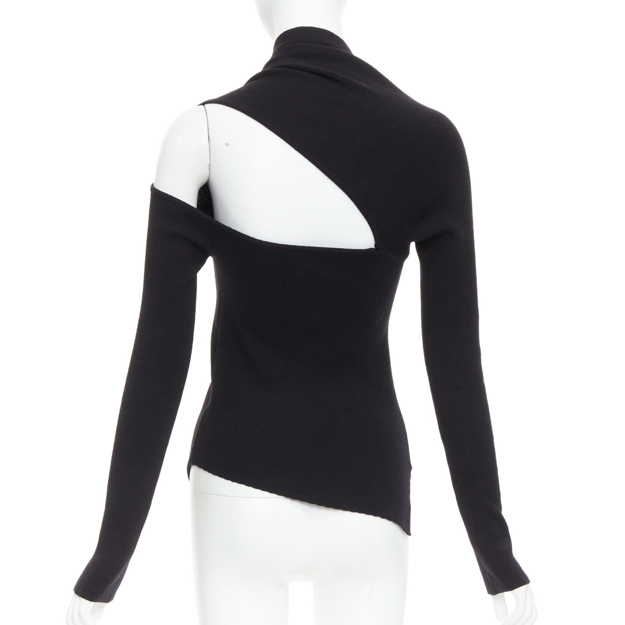 MONSE black extrafine merino wool cut out cold shoulder sweater XS
Reference: NKLL/A00522
Brand: Monse
Material: Merino Wool
Color: Black
Pattern: Solid
Closure: Pullover
Extra Details: May be styled in other ways.
Made in: