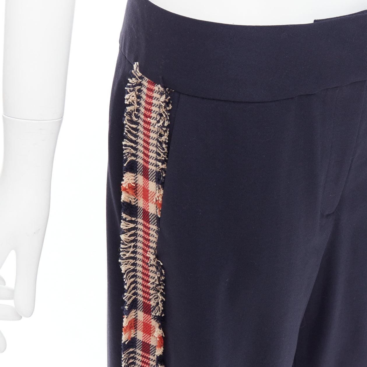 MONSE black virgin wool blend plaid side trim wide trousers US6 M
Reference: KNLM/A00346
Brand: Monse
Material: Virgin Wool, Blend
Color: Black, Multicolour
Pattern: Checkered
Closure: Zip Fly
Extra Details: Plaid frayed edge side trims.
Made in: