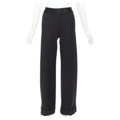 Pantaloni Monse in lana vergine nera e twill di cotone color crema con bordino con logo e gamba larga, taglia US2 S