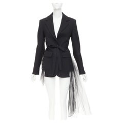 Monse: giacca blazer ibrida in tulle trasparente e lana vergine nera con retro asimmetrico, taglia US0 XS