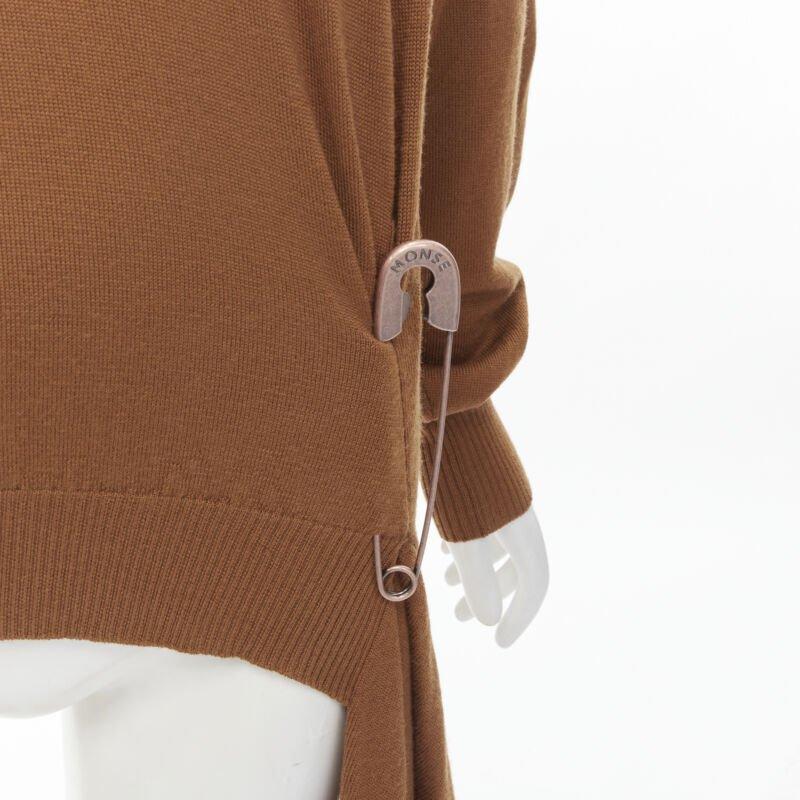 MONSE brown 100% wool XL safety pin draped hem sweater M
Reference: KNLM/A00111
Brand: Monse
Designer: Laura Kim and Fernando Garcia
Material: Wool
Color: Brown
Pattern: Solid
Extra Details: Decorative detachable copper-tone XL metal safety pin at
