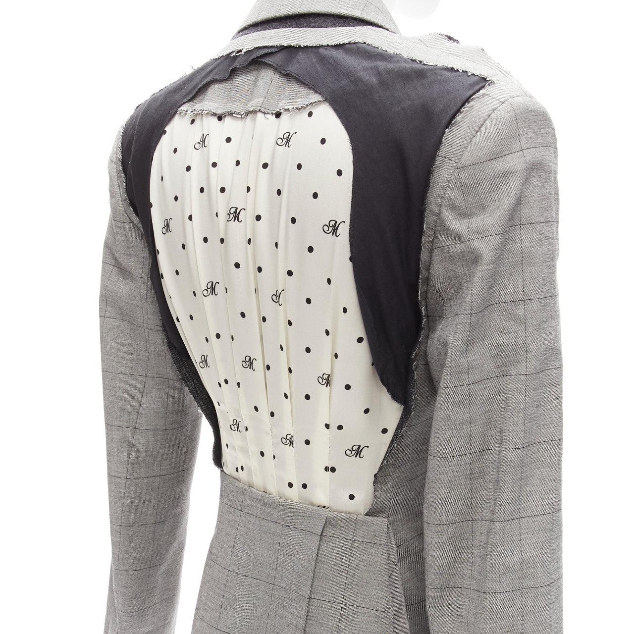 MONSE grey wool cotton deconstructed draped asymmetric blazer jacket US0 XS
Reference: NKLL/A00012
Brand: Monse
Material: Wool, Cotton, Blend
Color: Grey, Cream
Pattern: Plaid
Closure: Button
Lining: Black Fabric
Extra Details: Black/grey