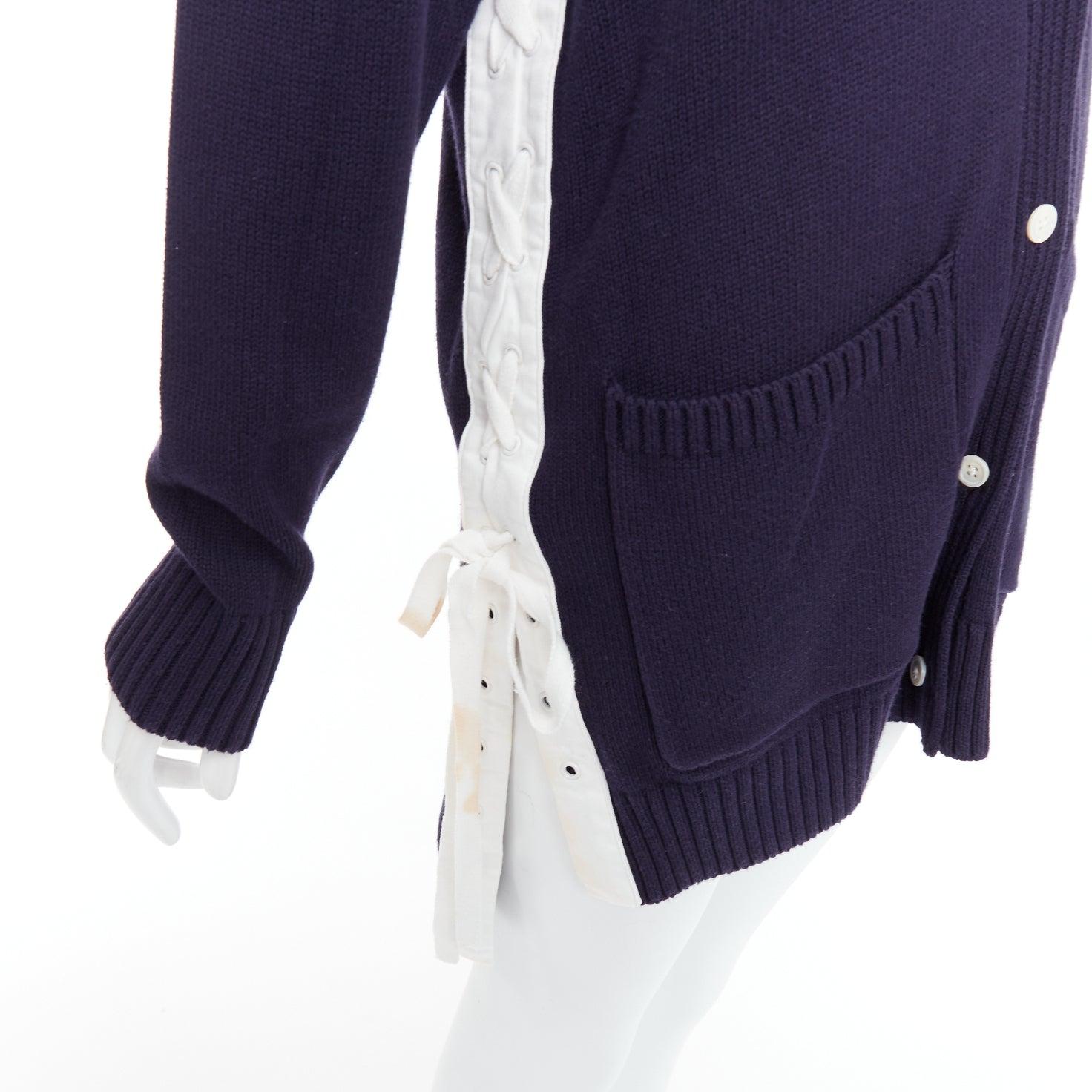 MONSE navy white cotton blend laced side hooded cardigan XS
Reference: KYCG/A00074
Brand: Monse
Material: Cotton, Blend
Color: Navy, White
Pattern: Solid
Closure: Button
Extra Details: White lace up details at sides.
Made in: