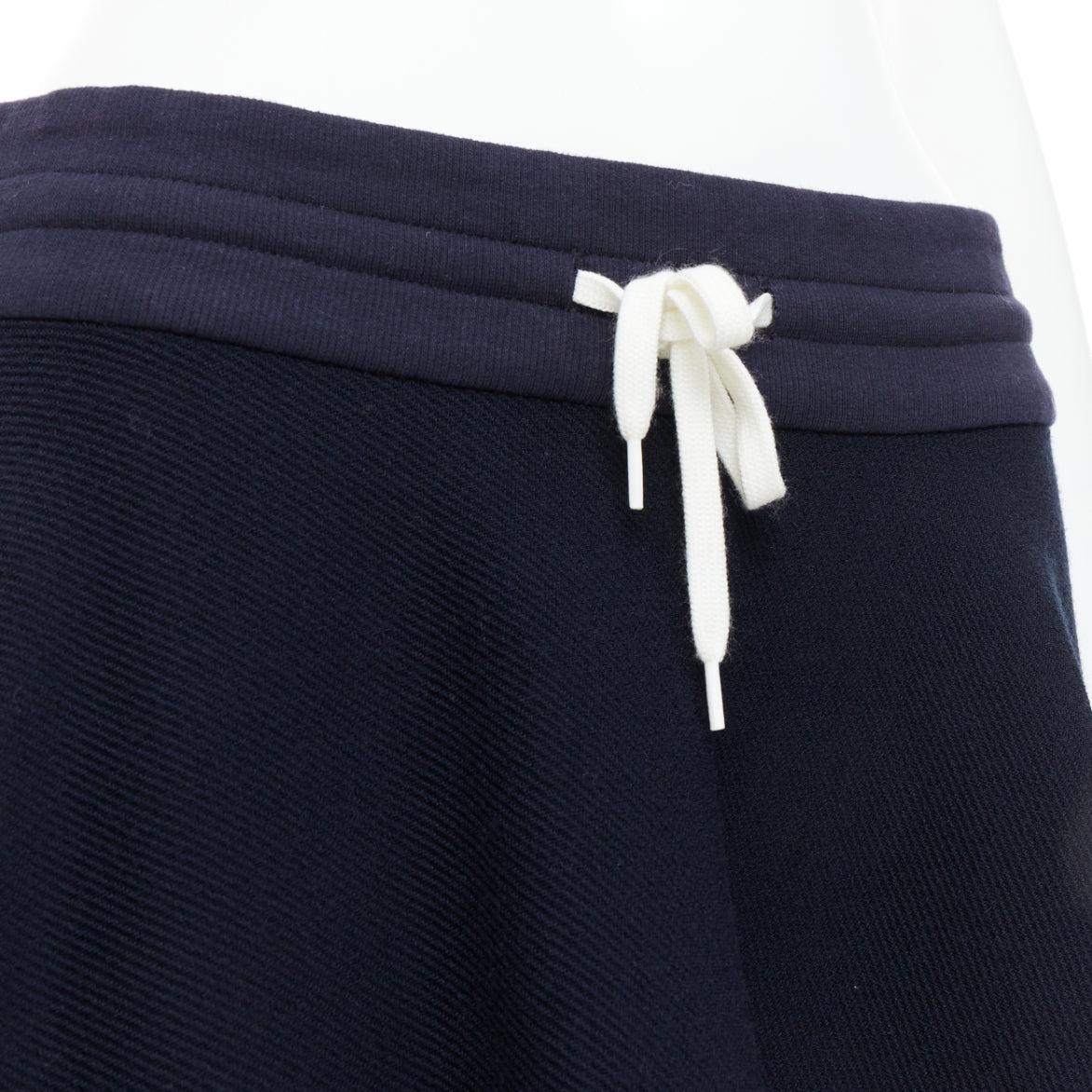 MONSE navy wool blend brown logo lining asymmetric skirt US6 M
Reference: KNLM/A00331
Brand: Monse
Material: Wool, Blend
Color: Navy, Brown
Pattern: Solid
Closure: Drawstring
Extra Details: Large logo printed at lining.
Made in: United
