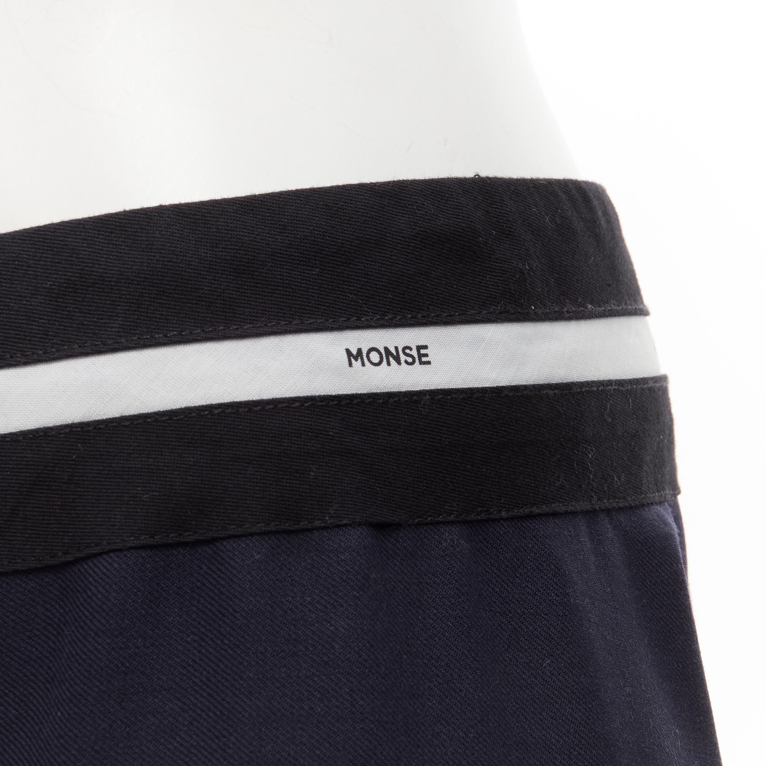 MONSE Runway mixed navy grey patchwork asymmetric skirt US4 S
Brand: Monse
Material: Wool
Color: Navy
Pattern: Solid
Extra Detail: Logo trim at waistband. Asymmetric hemline with contrast 'lining' fabric layered.
Made in: United