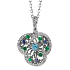 Monseo Blue Topaz, Blue Sapphire, Tsavorite and Diamond Flower Gold Necklace