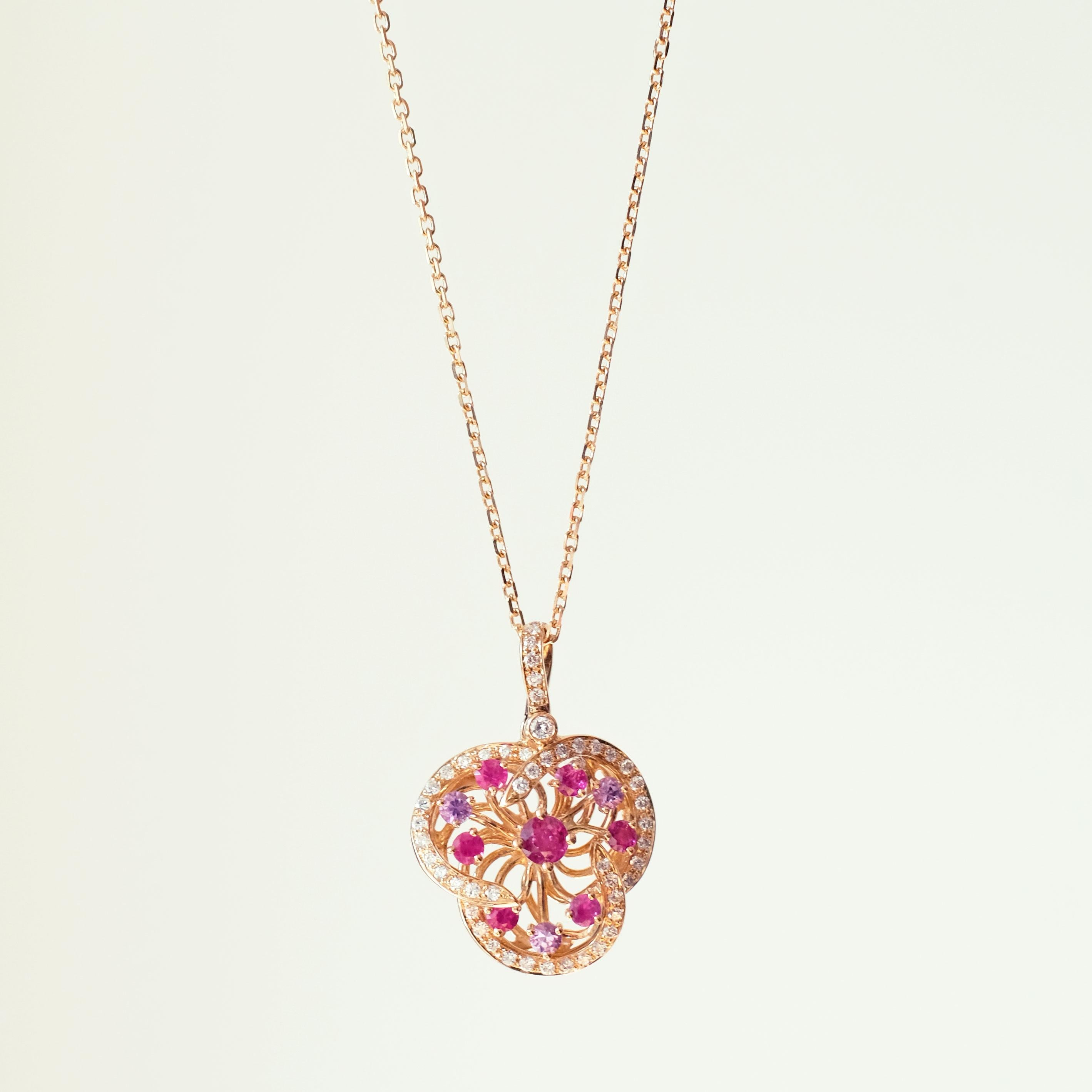 19.2K rose gold floral necklace with 49 brilliant cut diamonds with 0.28 ct. 7 pink sapphires with 0.70 ct. and 3 purple sapphires with 0.20 ct.

Crafted in rose 19.2K gold and set with a round pink sapphire, white diamonds, purple and pink