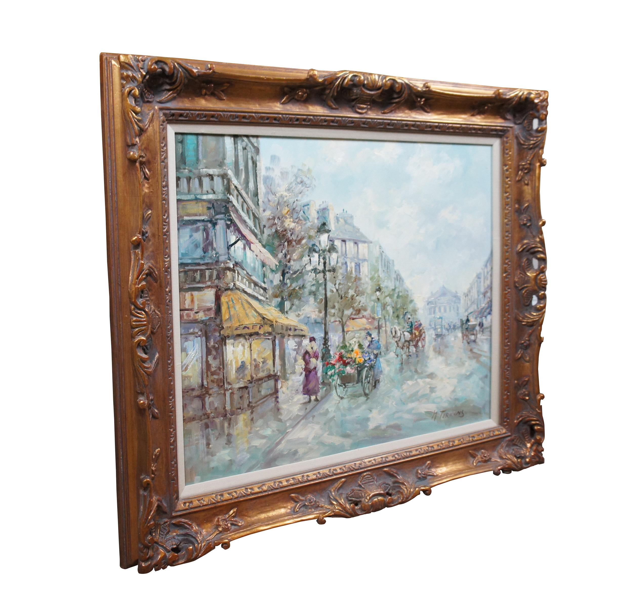 Mid to late 20th century impressionist oil on canvas painting by Spanish artist Monserrat S. Torrens. Depicts a pleasant cityscape showing a broad Paris street with colorful awnings, a flower cart, and several horses and carriages. Signed in corner.