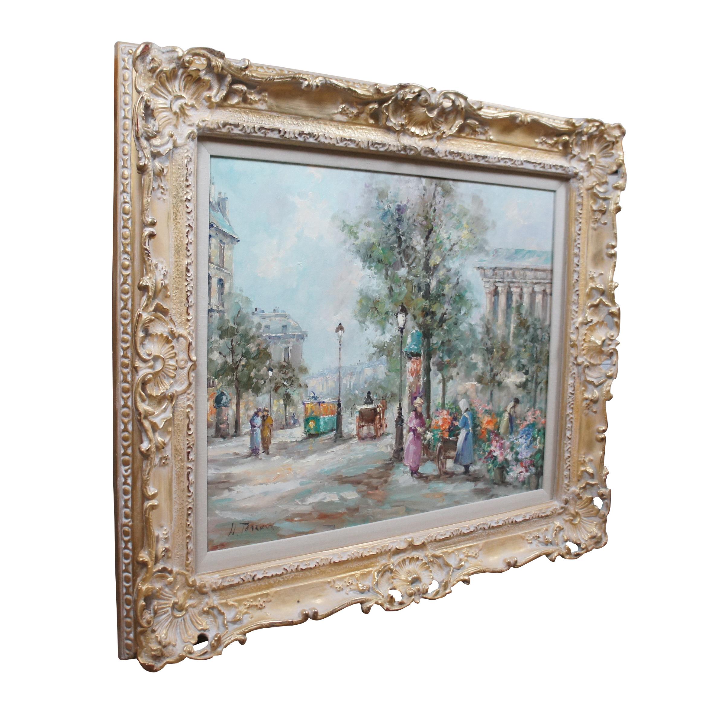 Mid to late 20th century impressionist style oil on canvas cityscape painting by Spanish artist Monserrat S. Torrens, depicting a Paris street bustling with figures, flower sellers and a street car. Signed in corner. Giltwood frame with foliate and