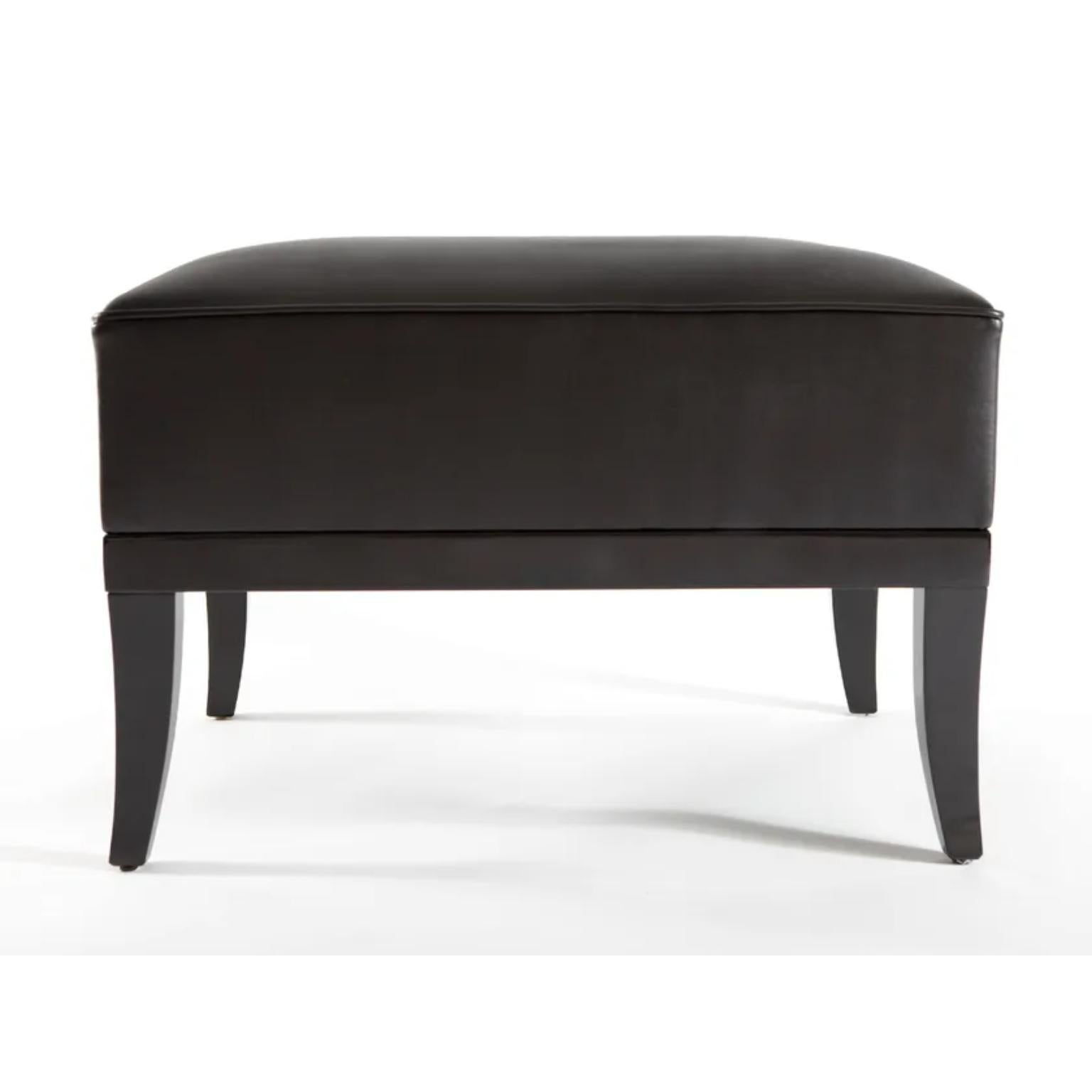 Monsieur T Ottoman by Munna
Dimensions: D 52 x W 65 x H 46 cm. SH: 46 cm.
Materials: Solid wood, foam, nickel, and leather.

Available in all Munna fabrics except Wild Silk. Available in client’s own
material. Available upholstered, Rosewood or