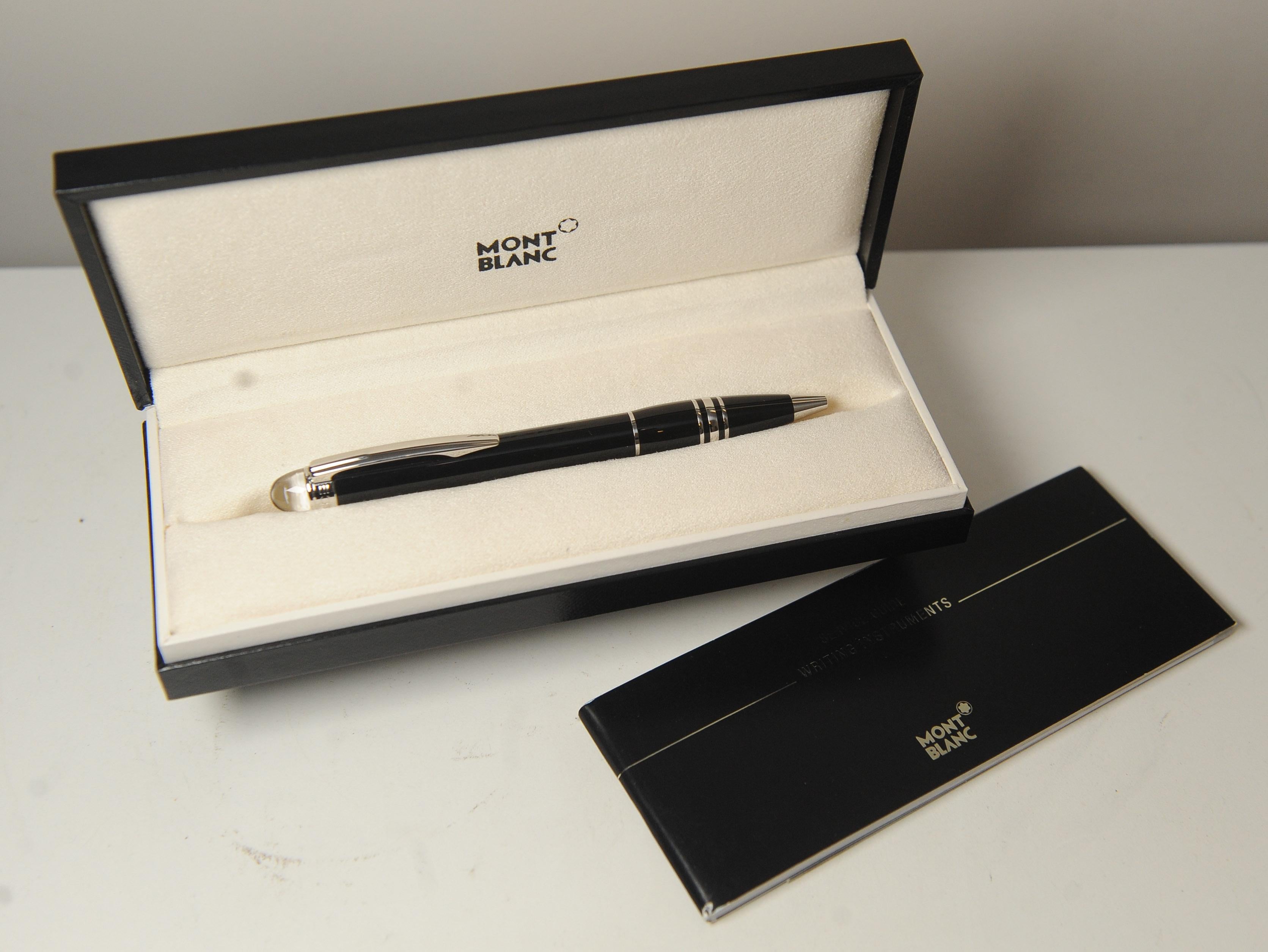 Montblanc StarWalker Authenticated Black Resin Ballpoint Pen With Original Box, Mont Blanc Paperwork and Booklet 

Serial no. listed on pen lid 

Purchased in Bahrain, in 2005
Made in France 

The peak of luxury design, Montblanc Starwalker pens are