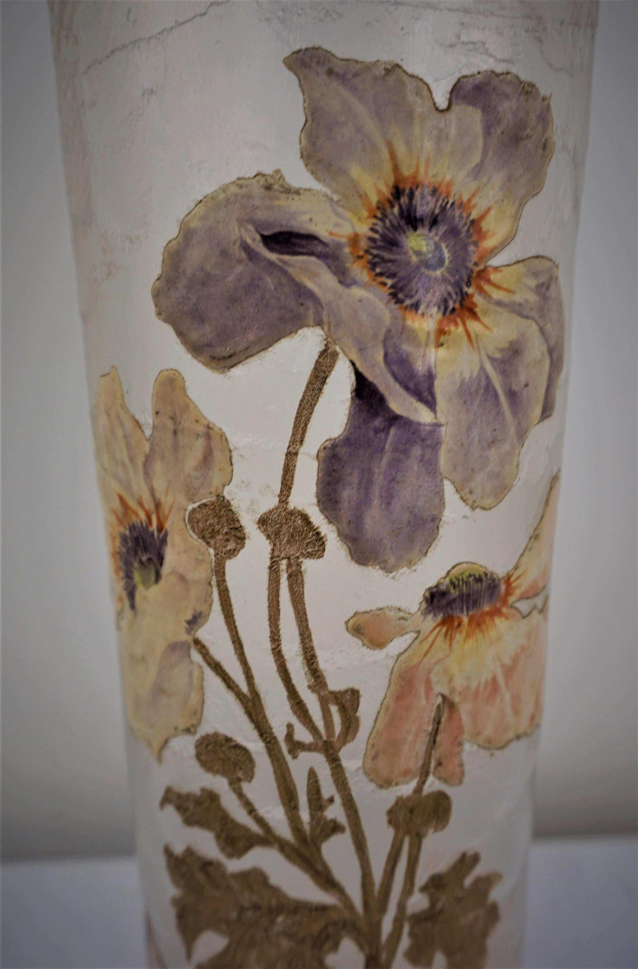 Fantastic art nouveau vase with hand painted enameled and gold flowers and leaves on acid-cut clear textured glass.