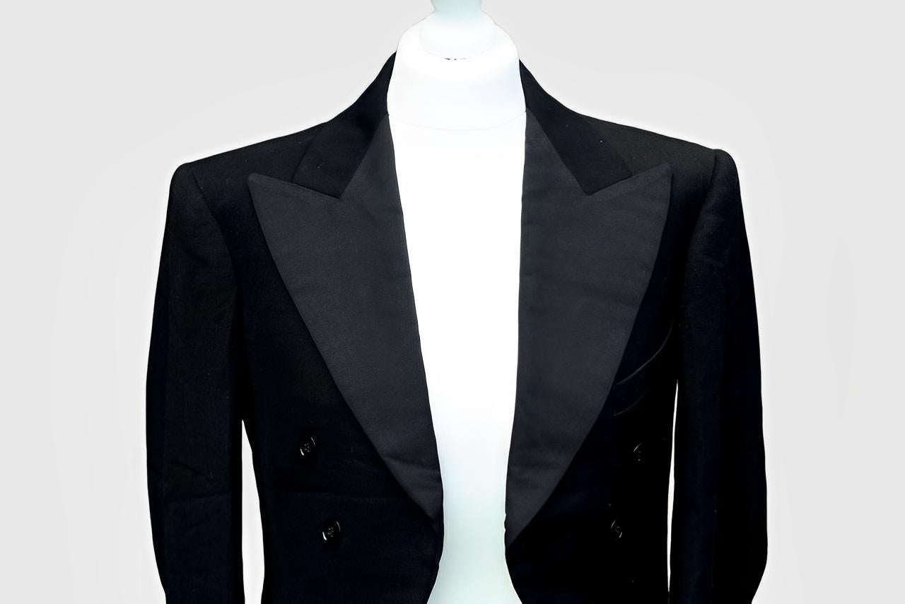 Veste de soirée en laine noire, taillée sur mesure par Burton, avec l'étiquette noire et argentée 