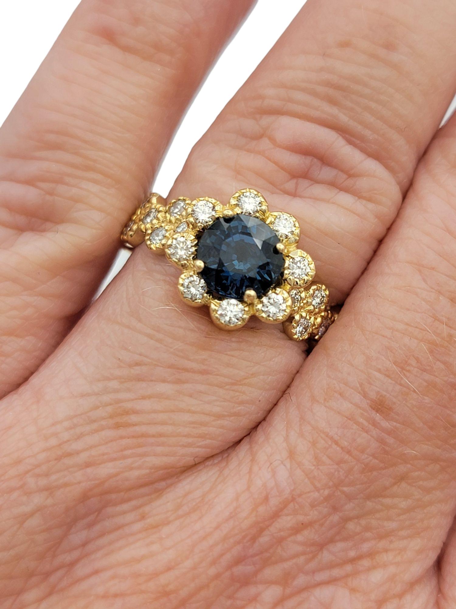 Montana Blue Sapphire and Diamond Halo Flower Motif Ring in 14 Karat Yellow Gold en vente 3