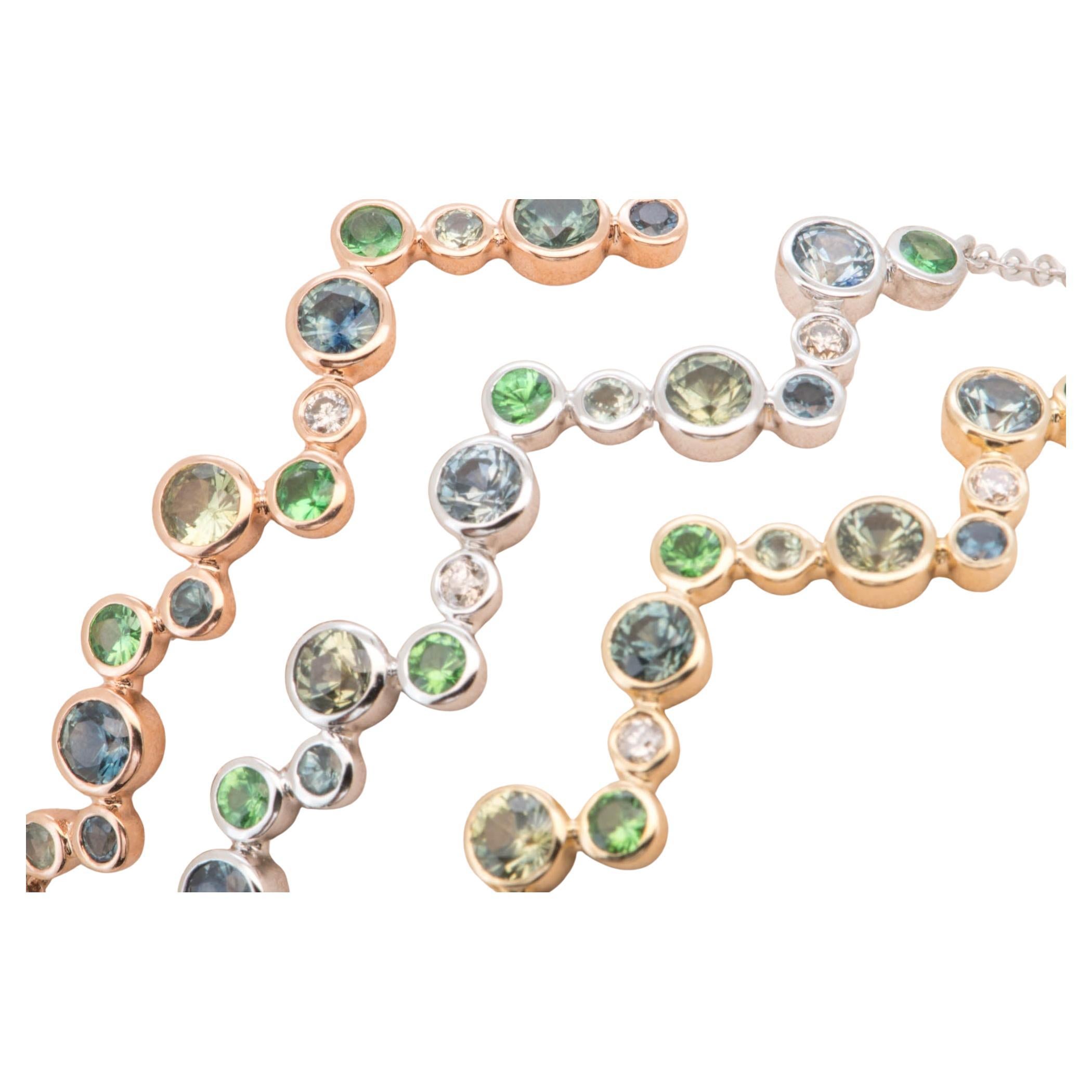 ♥ A pair of lively and fun earrings bezel set with a variety of bright green tsavorite, teal blue Montana sapphires, and earth-mined diamonds
♥ The setting measures 7.6mm in length (North South direction), 45mm in width (East West direction), and