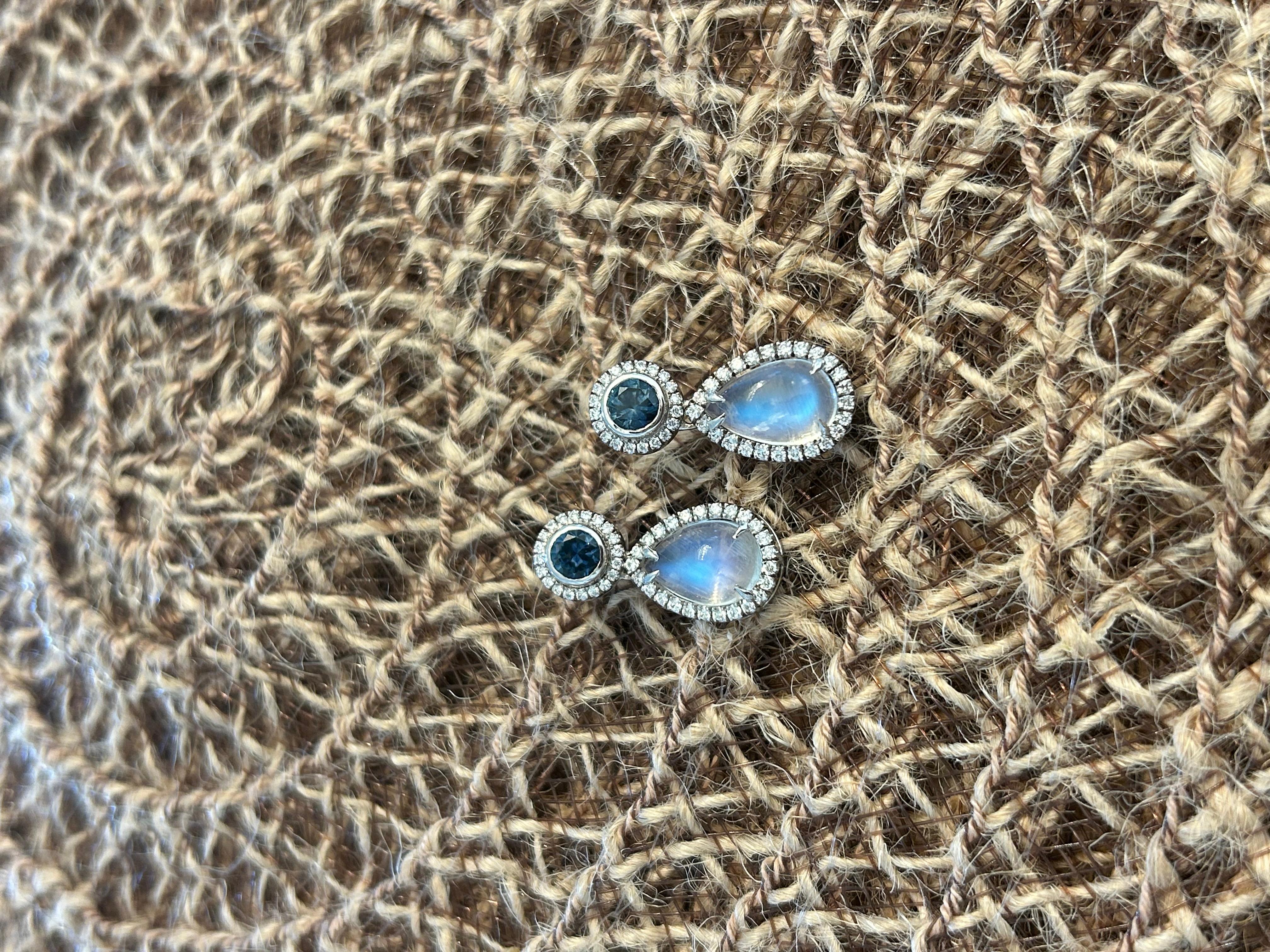 Modern 7.64ct Moonstones paired with 1.54ct Montana Sapphires, in 18K earrings. For Sale