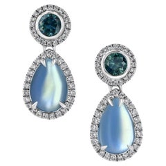 Montana Sapphire and Rainbow Moonstone. 18K white gold earrings. 
