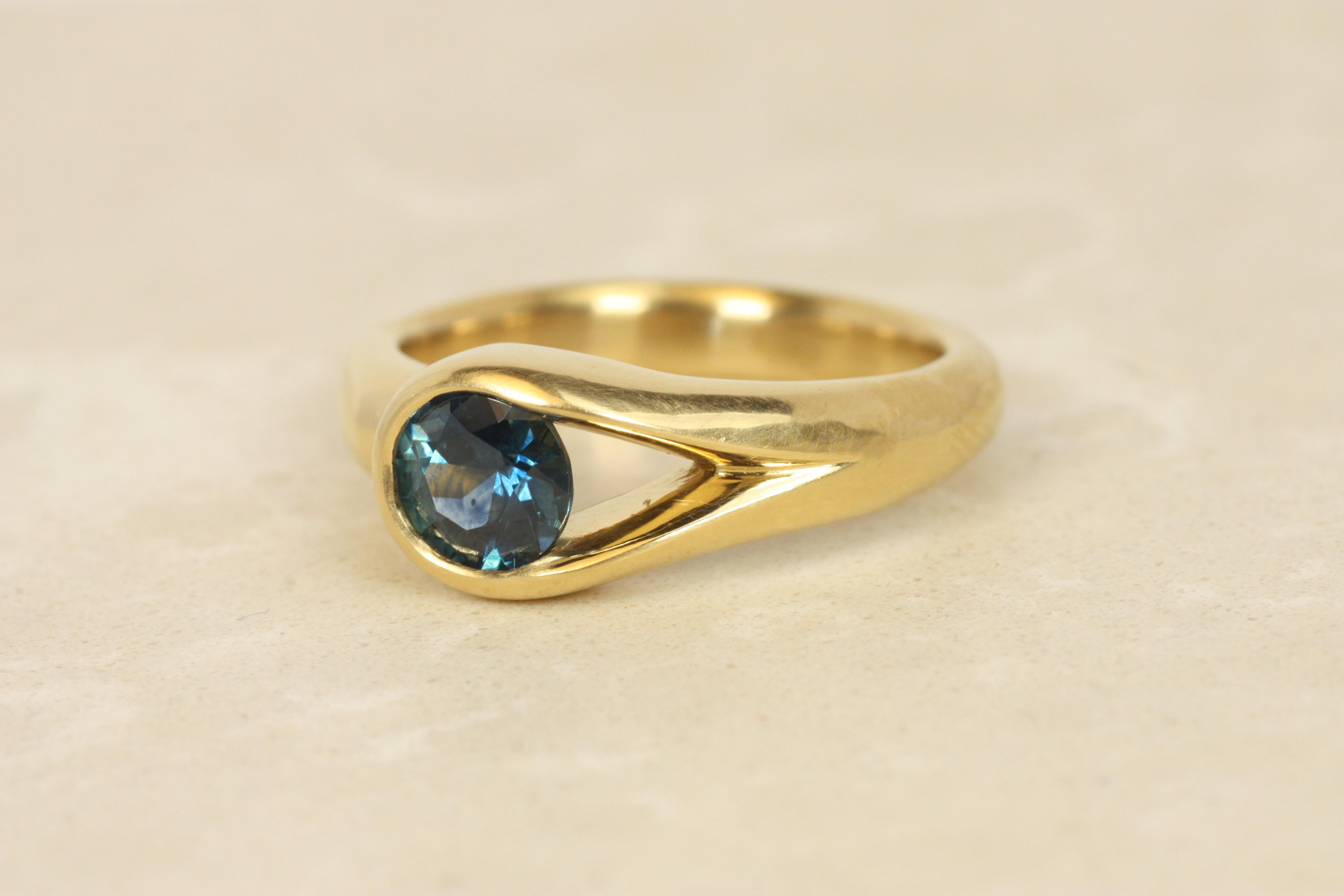 Round Cut Montana Sapphire Asymmetrical Split-Shank Solitaire Ring in 22K Gold by Bracken For Sale