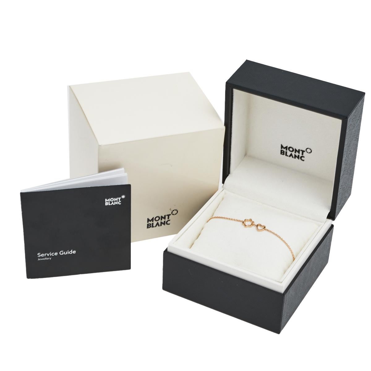 Montblanc brings you this lovely bracelet in 18k rose gold to adorn your wrist with beauty! The slender chain holds two charms, one in the shape of a heart and the other in the shape of the brand's star logo. The bracelet is complete with a lobster