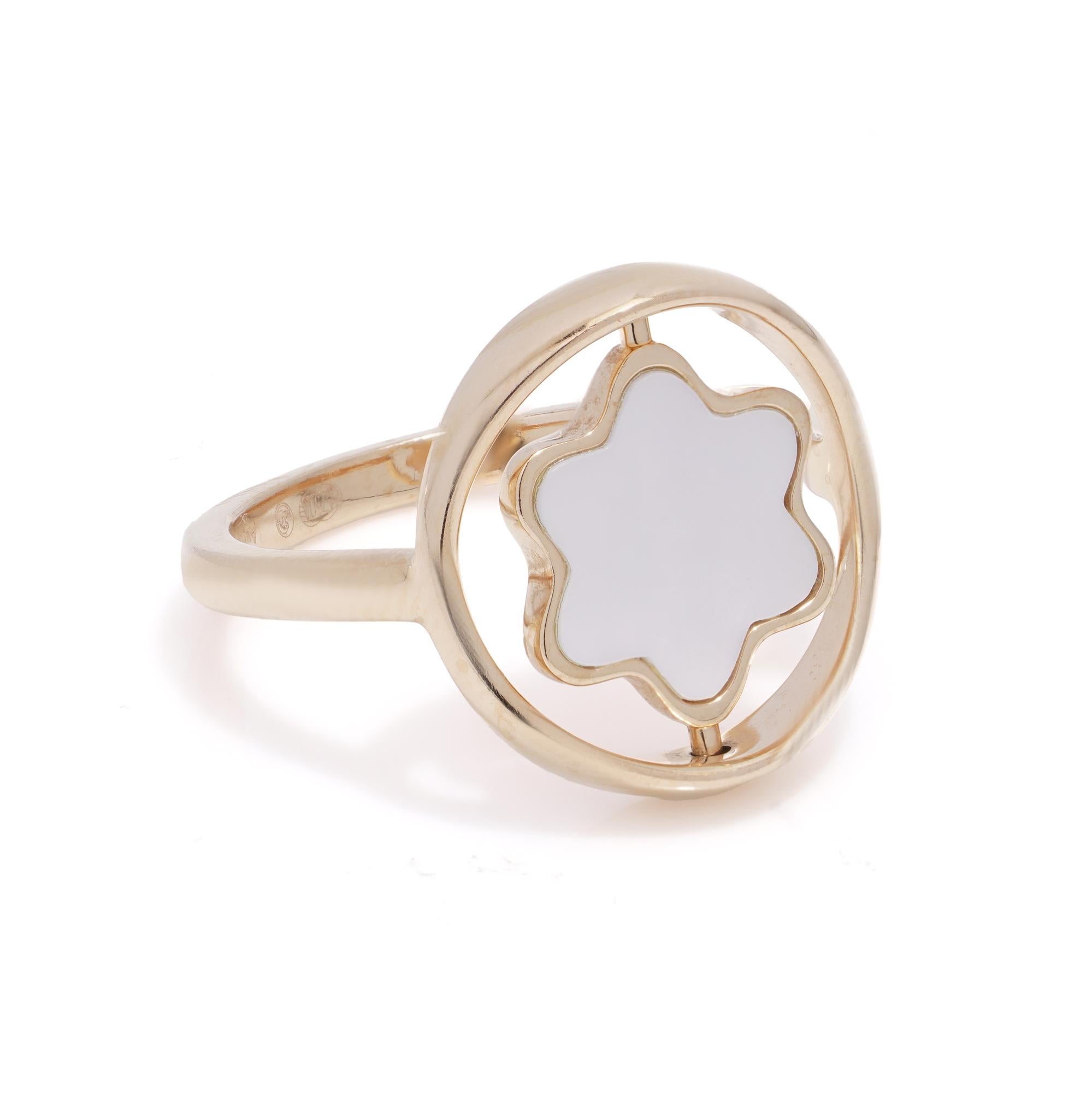 Women's Montblanc 18kt pink gold ring with rotating mother-of-pearl star emblem. For Sale