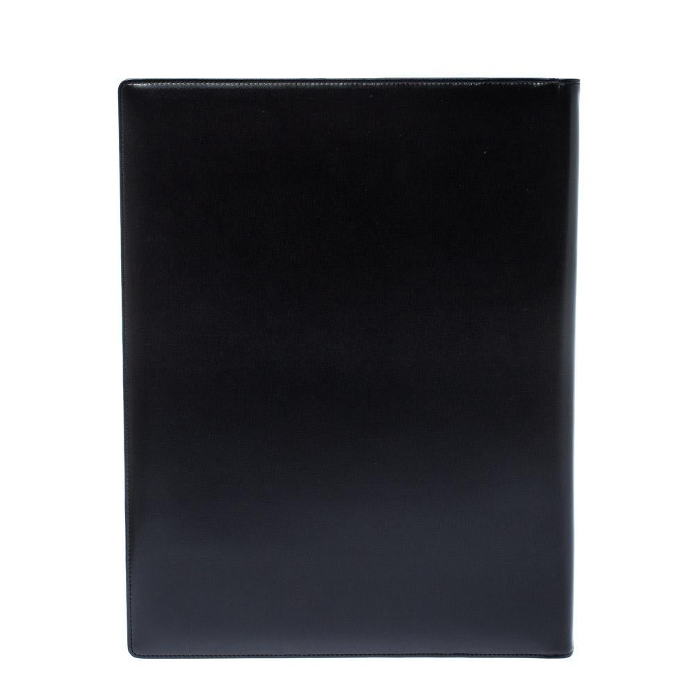 This practical and opulent Conference folder will uphold all your professional details efficiently. Crafted from black leather, it features papers inside and the signature Montblanc star on the front.

Includes: Info Booklet, Original Box, Original