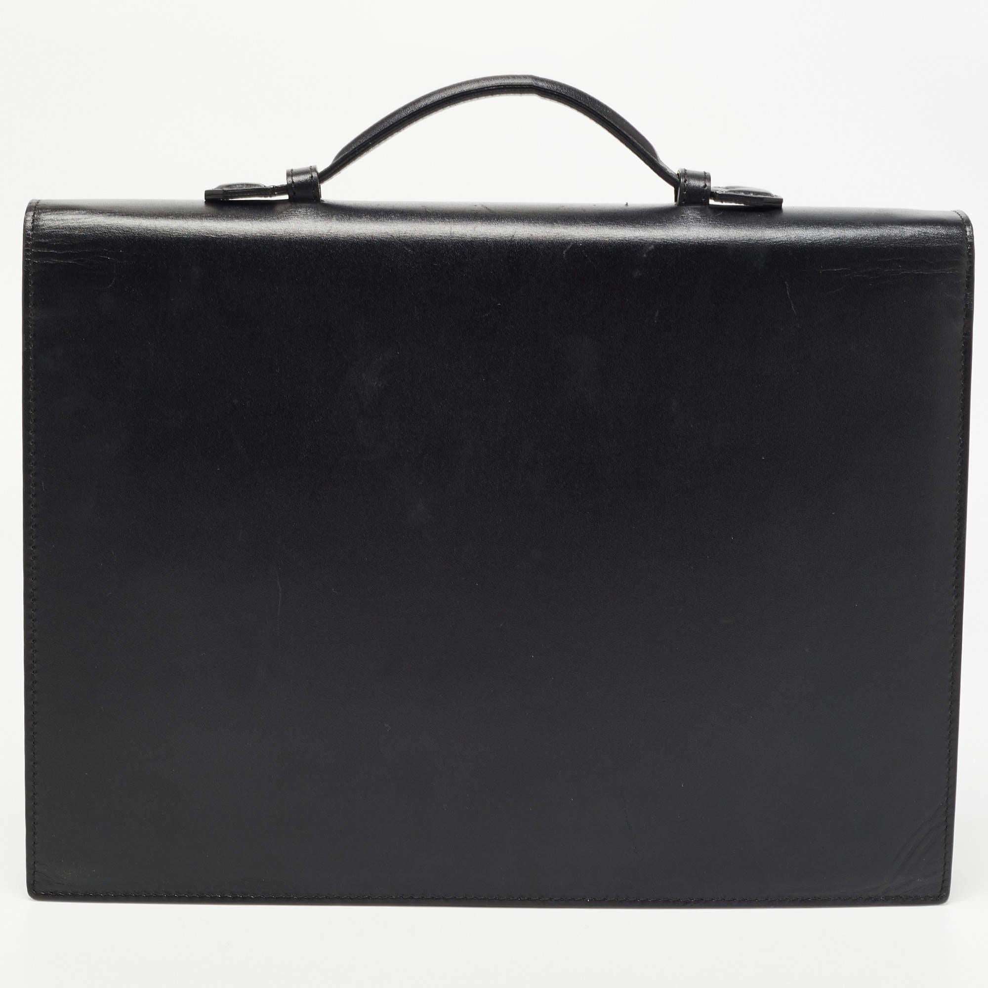 Say hello to this luxurious briefcase that has been crafted from fine materials. Equipped with sturdy handles, this piece is perfectly made to carry your essentials while you set out.

Includes: Original Dustbag, Info Card

