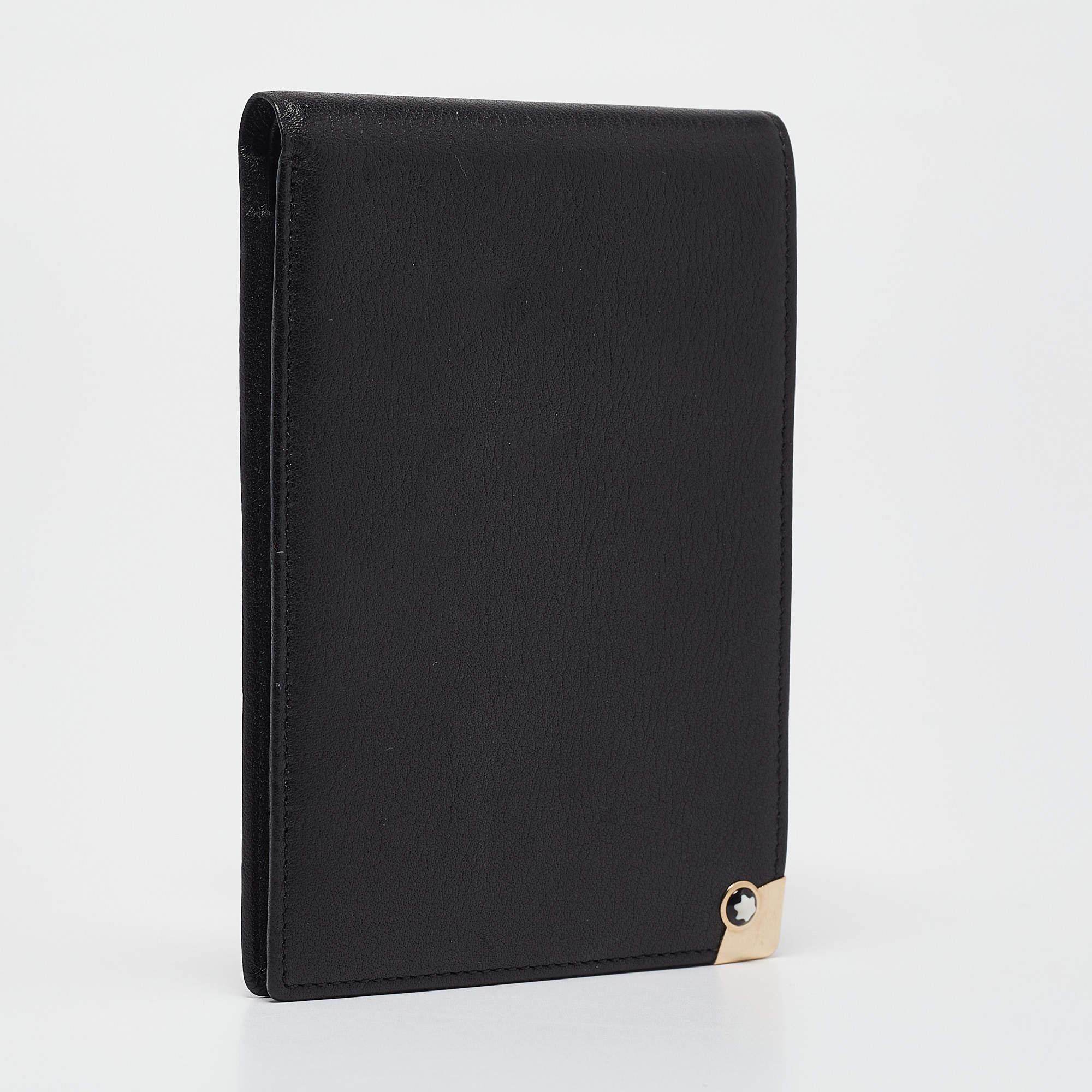 The Montblanc Meisterstück Mini Bifold Agenda Cover in black leather is a compact and refined accessory designed for those who value both function and style. Crafted from high quality leather it features sleek lines precise stitching and the iconic