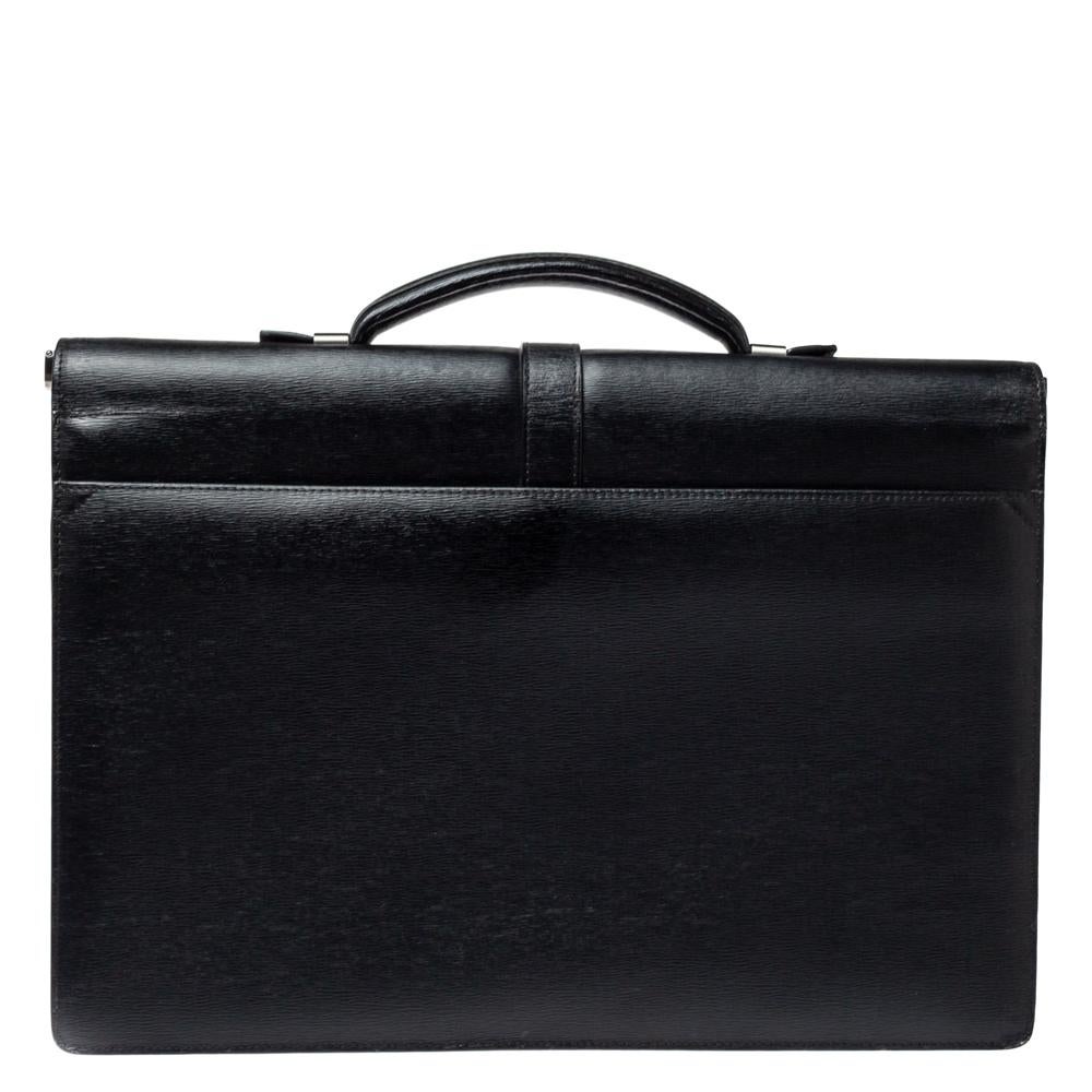 Over the years, Montblanc has risen as a brand that all luxury lovers can trust for their designs are made with high attention to quality and craftsmanship. This briefcase is a great example. It has been crafted from black textured leather and