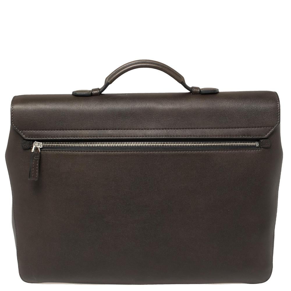 Over the years, Montblanc has risen as a brand that all lovers can trust for their designs are made with high attention to quality and craftsmanship. This briefcase is a great example. It has been crafted from dark brown leather and designed with a