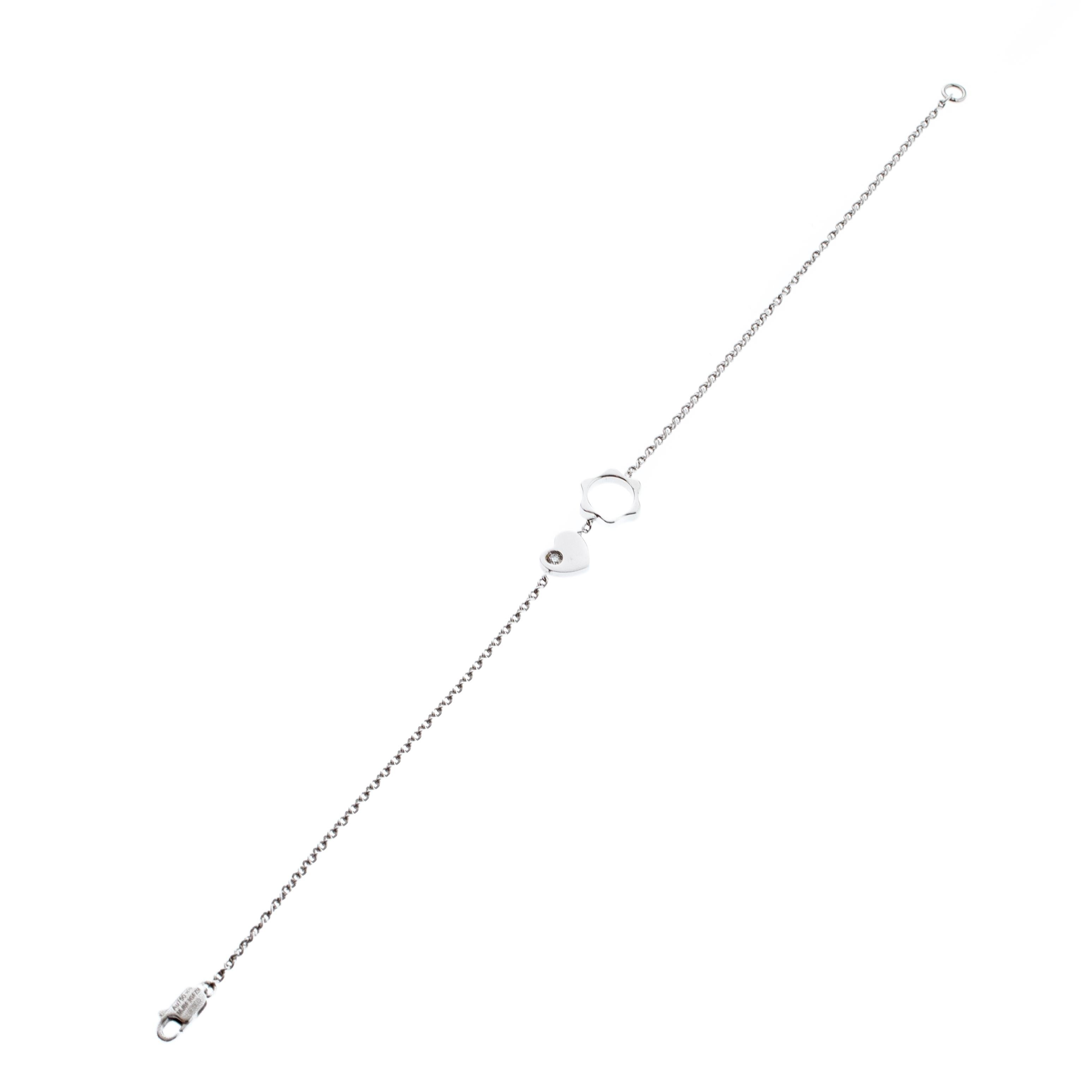 This lovely Montblanc bracelet is one accessory you will definitely love owning. Crafted from 18k white gold metal, this piece flaunts a diamond embellished heart and the brand's star logo attached side by side to gracefully highlight your