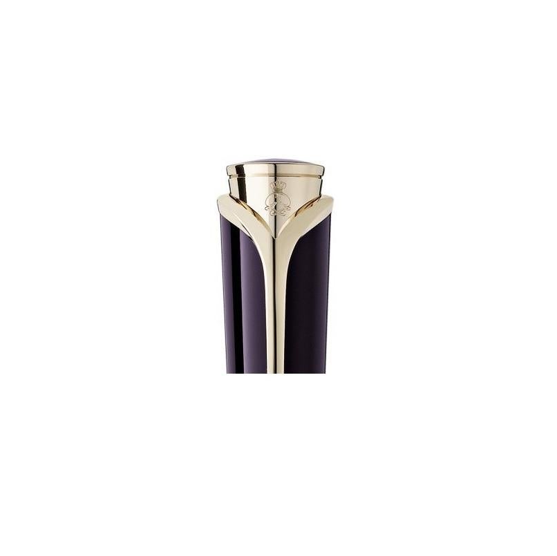 Montblanc Diva line Princess Grace de Monaco collection ballpoint pen, Deep purple precious resin body and cap with twist mechanism. Champagne colour rose gold fittings. Clip set with a drop cut pink topaz weighing 0.39ct.
106633
