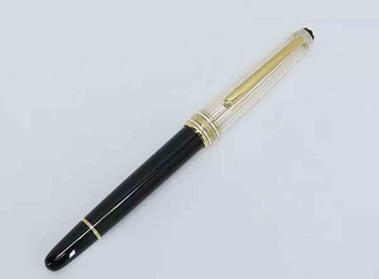 It is a very rare piece to find.
Brand New , Nib has not been used . There is no ink in the pen.
MONTBLANC MEISTERSTUCK  SOLITAIRE FOUTAIN PEN
Pen Nib 18 K Gold
Black Silver and Gold 
The Montblanc Meisterstuck BN 1527292  Fountain Pen Gold Black