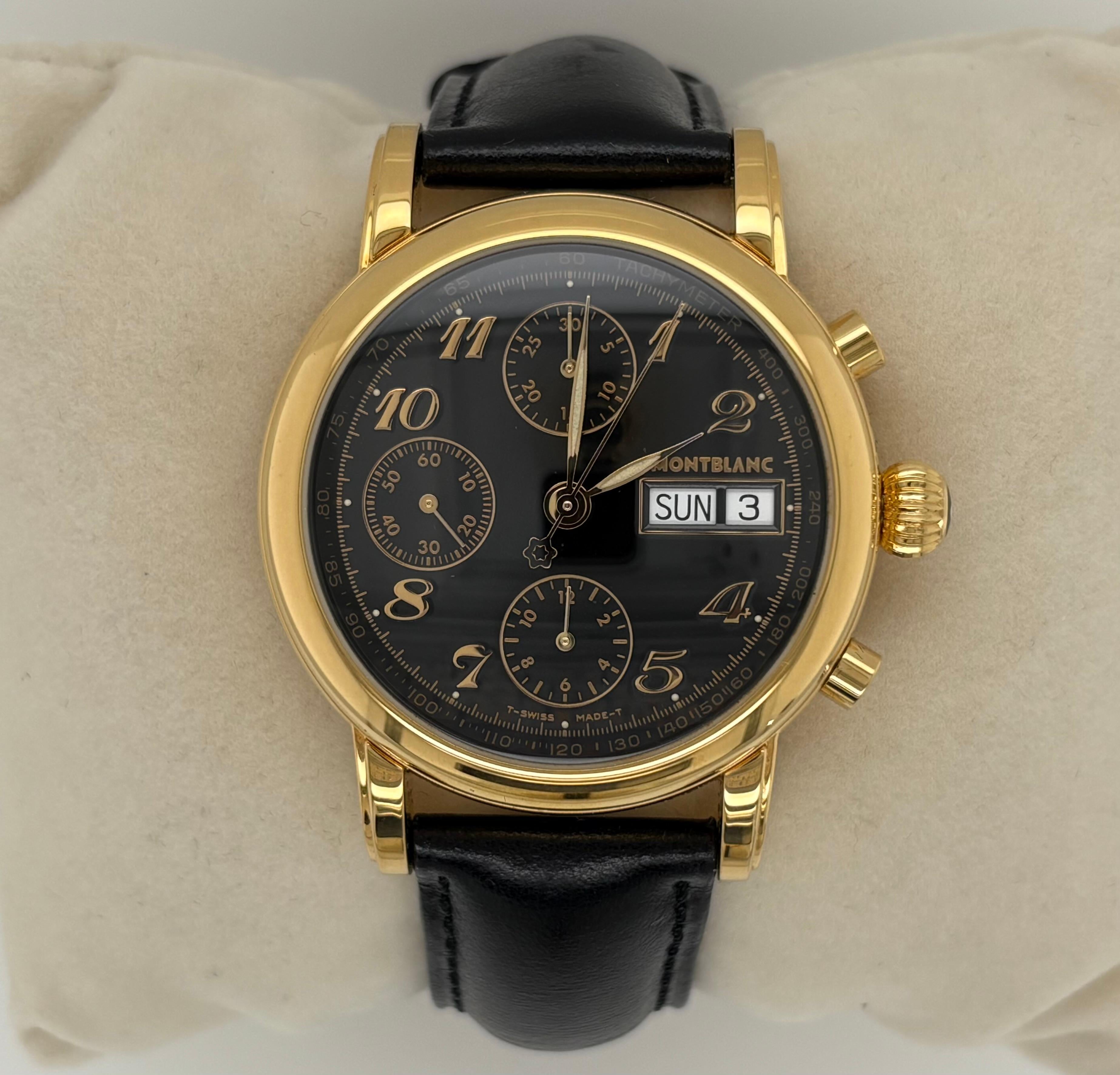 Montblanc Meisterstuck Chronograph watch, model 7001, features a lustrous gold-plated stainless steel case paired elegantly with a black dial. 
The case measures 38mm in diameter (42mm including the crown), offering a balanced and timeless
