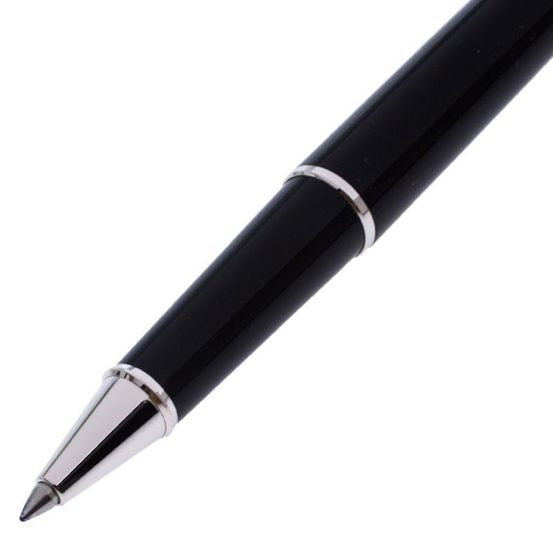 This Montblanc Meisterstruck Diamond Chopin ballpoint pen is crafted from famous black precious resin with silver-tone details. The pen comes with the diamond star emblem at the top of the cap. The pen is equipped with black ink and signature