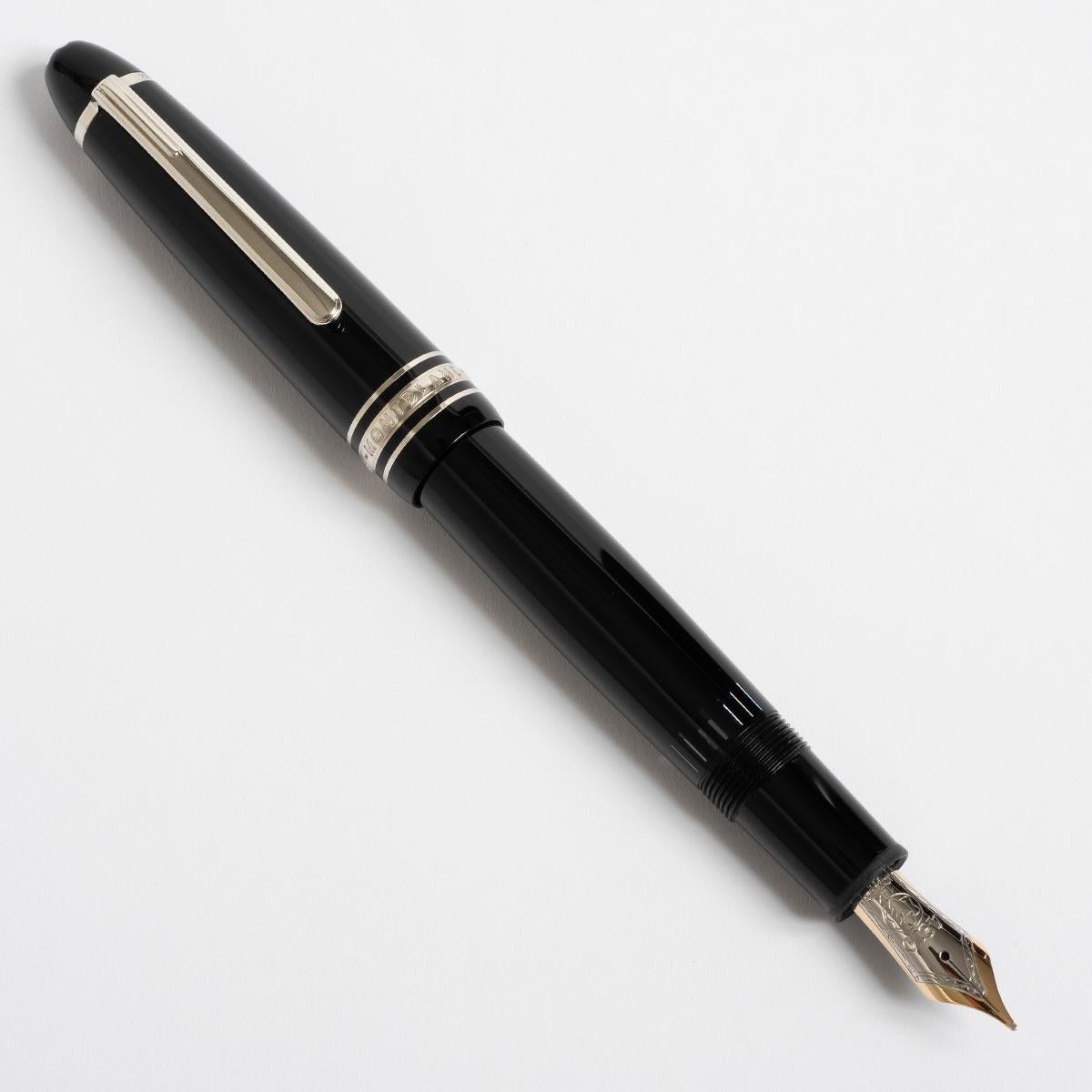 Our large Montblanc fountain pen for ink wells, reference 2500 features a resin case with platinum plated clip and 18k gold nib. This example comes complete with box, service box and benefits from a full Montblanc service (UK) in 2022, at £63. This