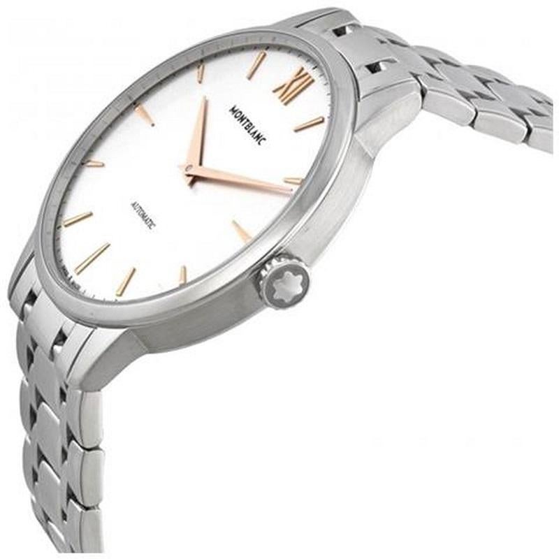 Stainless steel case with a stainless steel bracelet. Fixed stainless steel bezel. Silver white dial with rose gold-tone hands and index hour markers. A Roman numeral marks the 12 o'clock position. Dial Type: Analog. Automatic movement with a