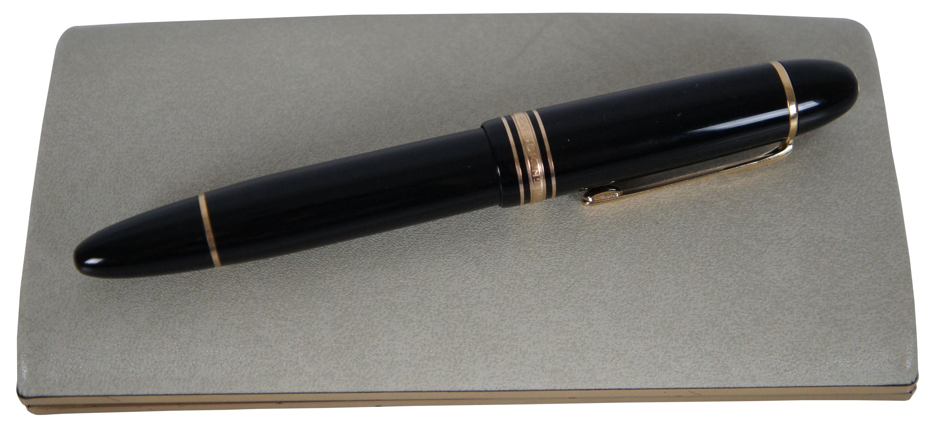 Vintage Montblanc Meisterstuck No 149 black reservoir style fountain pen with two tone 4810 14K gold 585; includes box.

Measures: 5.75” x 0.75” / Box - 6.5” x 3.25” x 1” (Length x Width x Depth).