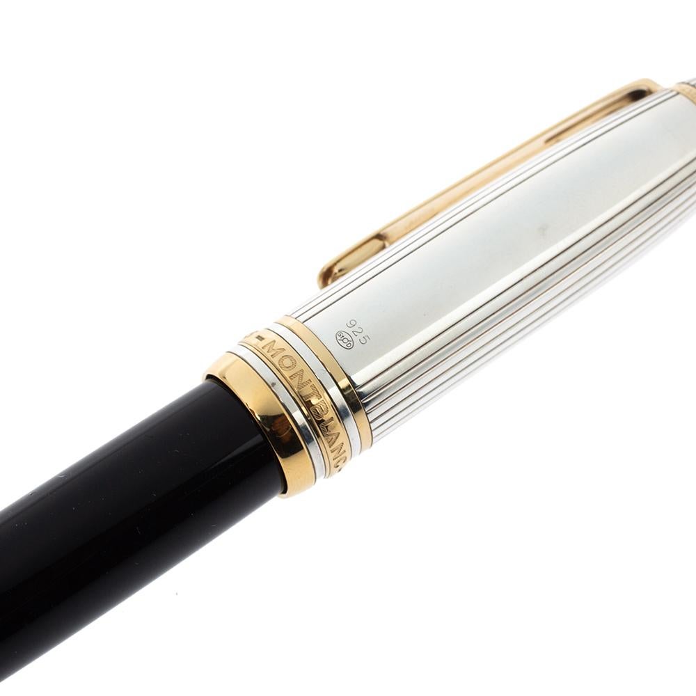 This splendid Montblanc Meisterstuck Solitaire Doue fountain pen is crafted from black resin and silver 925 and gold finish metal and features a striped pattern on the cap along with the brand logo and the well-known star emblem perched on the top.