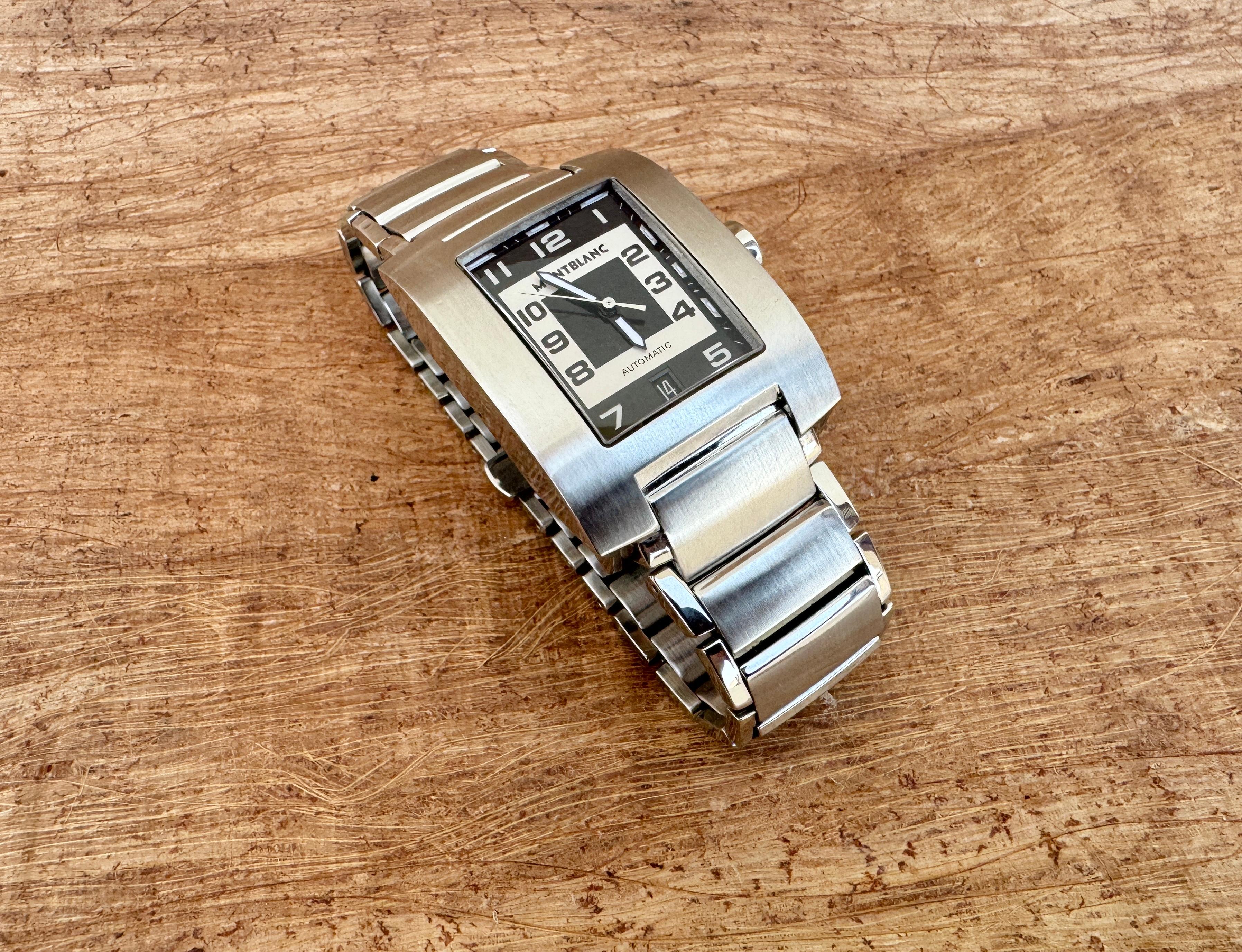 Brand: Montblanc

Model: Profile

Reference Number:7058

Movement: Automatic

Case Material: Stainless steel

Measurements : Case width: 35 mm. (without crown) x 45mm

Band Type : Stainless steel With Marked Buckle

Band Condition : Used In