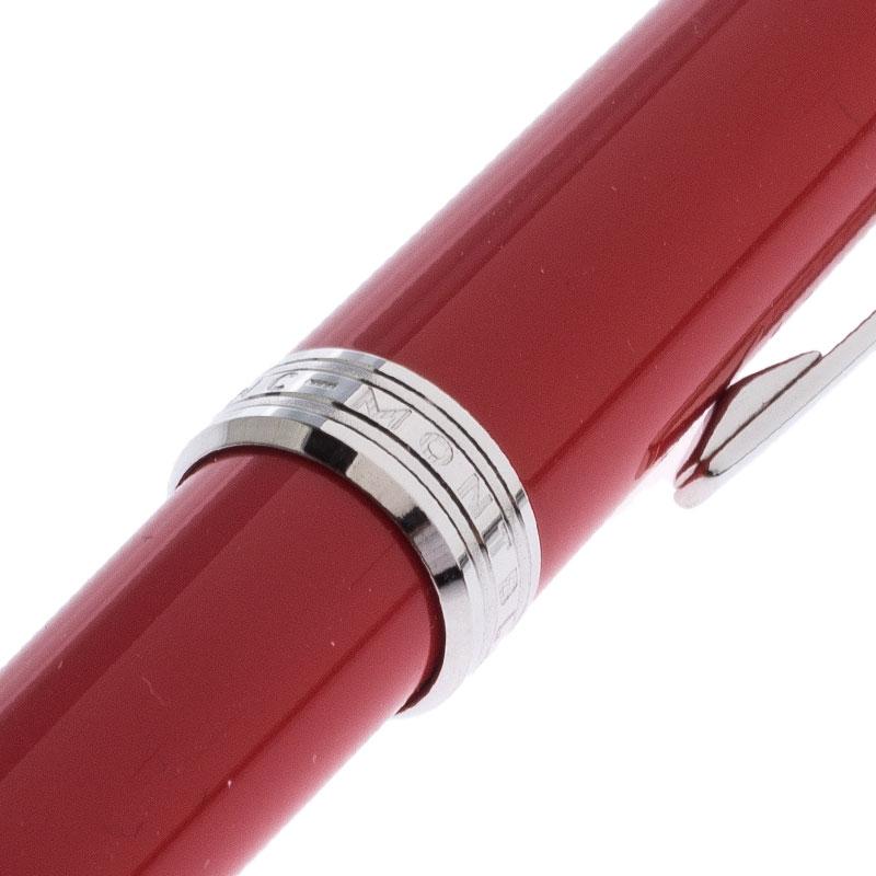 Montblanc brings you this lovely ballpoint pen that has been made from red resin and fitted with platinum-finish metal. It has a pocket clip and the famous star logo on the top. Filled with black ink, the pen ensures smooth writing.

Includes: