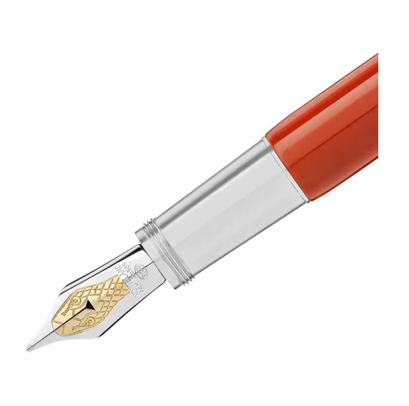 Features Clip
Serpent clip in vintage look with two green spinels set as eyes of the serpent
Barrel
Precious coral-colored lacquer
Cap
Precious coral-colored resin with Montblanc emblem made of coral- and ivory-colored resin
NIB
Handcrafted Au 585 /