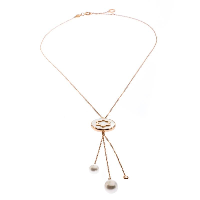 We can't stop admiring this beauty from Montblanc! Beautifully crafted from precious 18k rose gold, this necklace is a stunner. It has a pendant inlaid with Mother of Pearl and the iconic star emblem. It is further styled with dangling chain tassels
